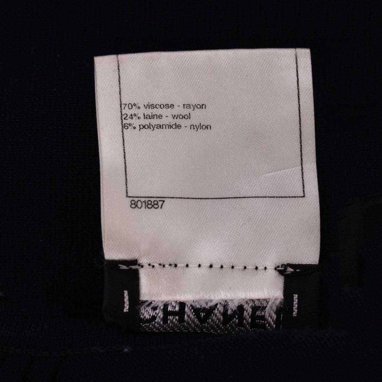 Vestido Chanel Colección París-Bombay con botones de elefante con el logotipo 