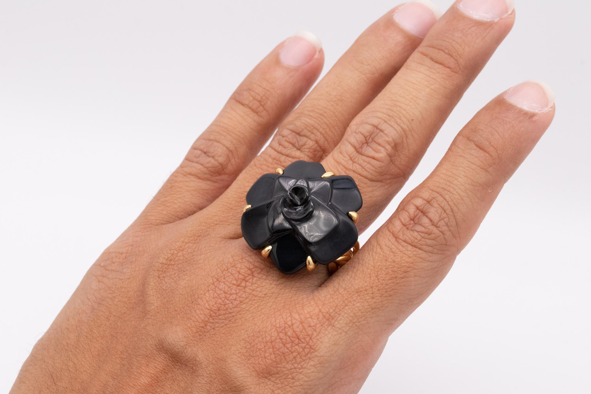 Large Camelia ring designed by Chanel.

The Camelia ring, is one of the most iconic modern pieces of jewelry from the house of Chanel. Crafted in Paris France, with organics patterns in solid yellow gold of 18 karats. The entire body is finished,