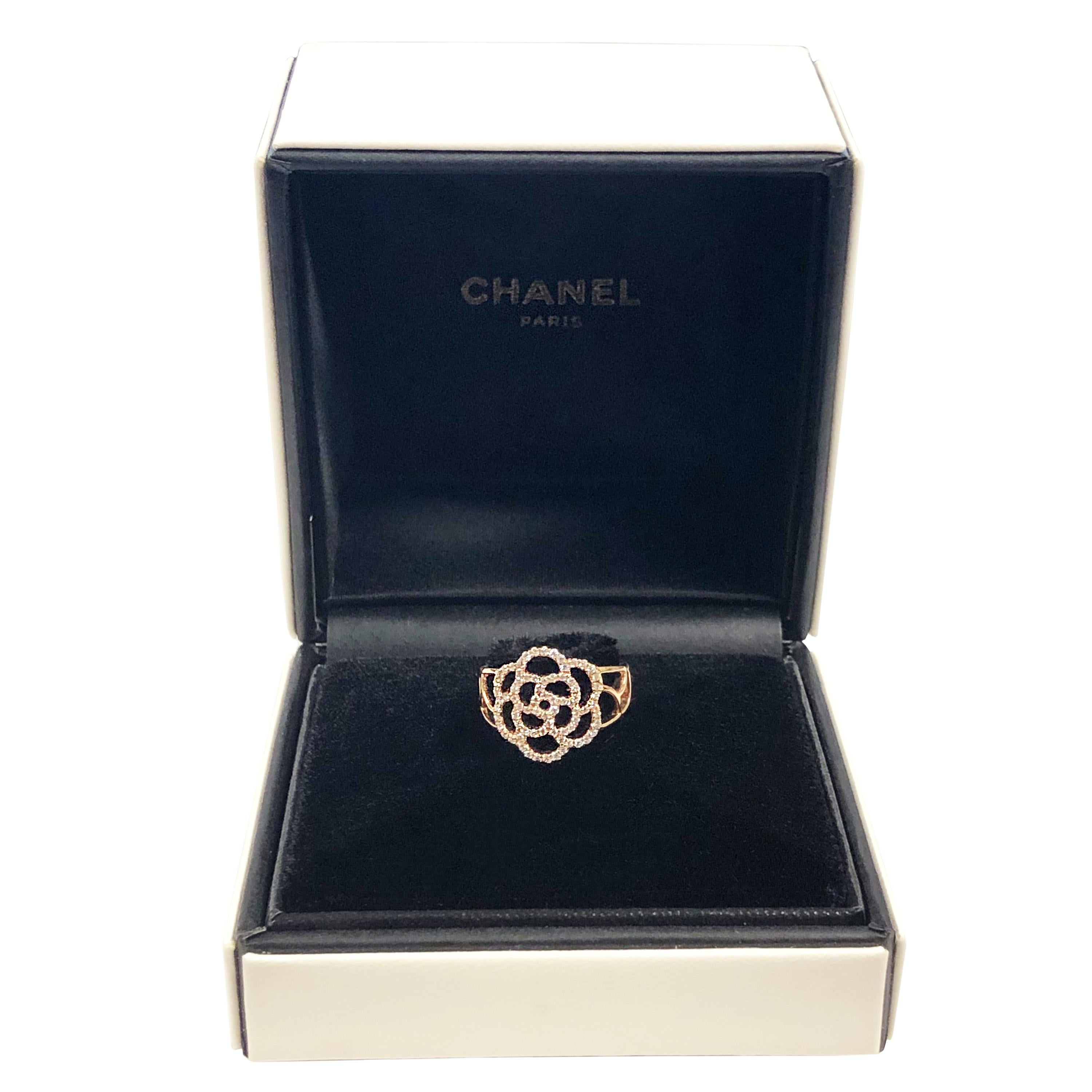 Circa 2017 Chanel Paris Camelia collection 18K Rose Gold Ring, set with Round Brilliant cut Diamonds totaling 1 Carat. The top of the Ring measures 5/8 inch across, finger size 6 ( 52 European ) Near unworn excellent condition in original