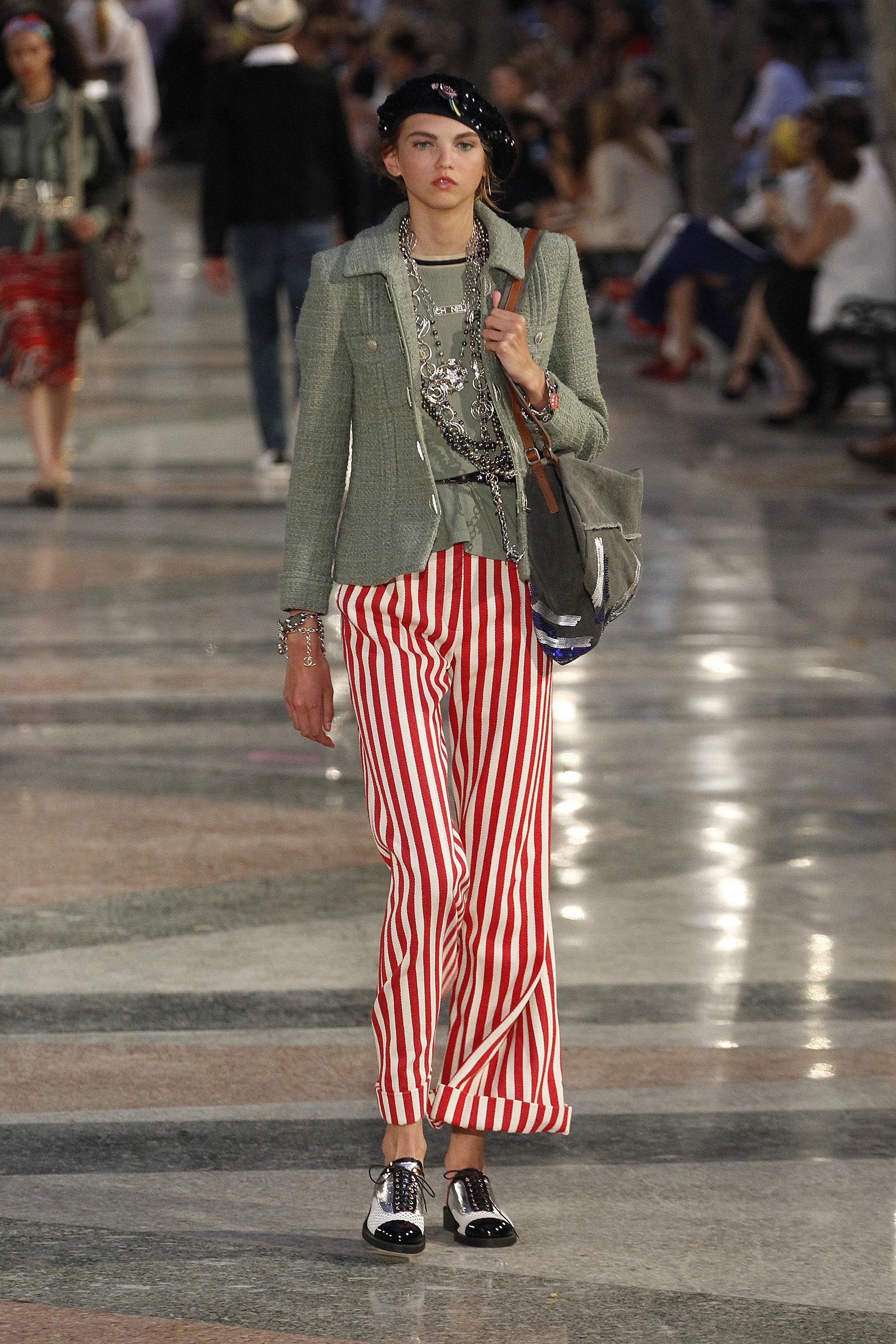 Famous Chanel khaki tweed jacket ~ from Runway of Paris / CUBA Cruise Collection by Karl Lagerfeld
As seen on many celebs!
- CC logo gunmetal quilted buttons
- tonal silk lining with camellias, chain link at hem