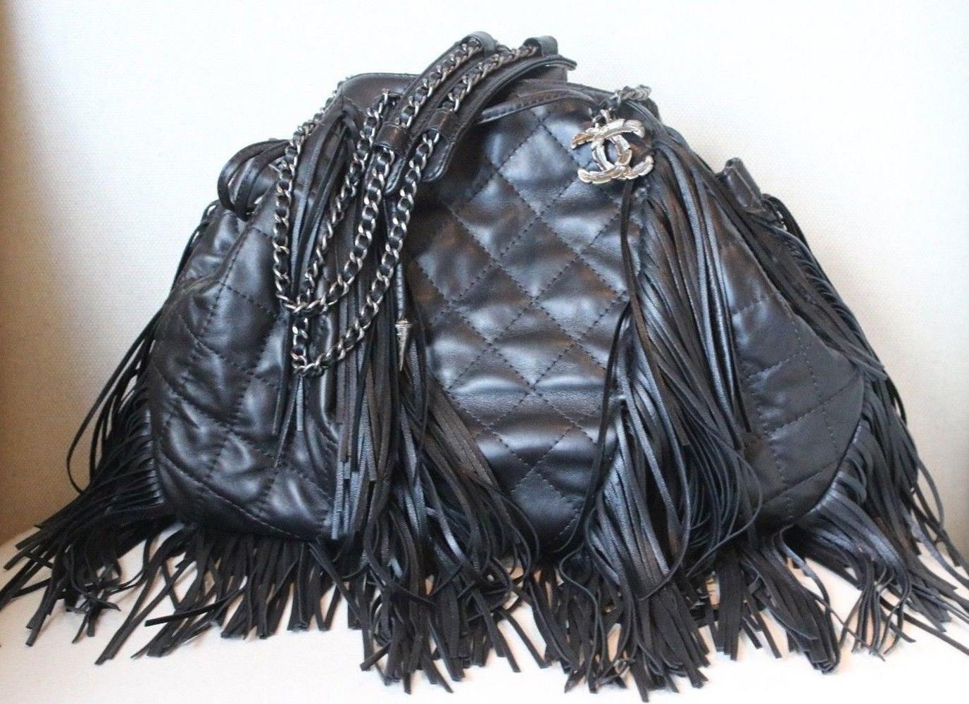Chanel Bag. This authentic Chanel Paris-Dallas Drawstring Fringe Shoulder Bag Quilted Leather presented in the brand's Paris Dallas Metiers d'Art 2013-2014 Collection mixes avant-garde Parisian sophistication with a touch of western americana