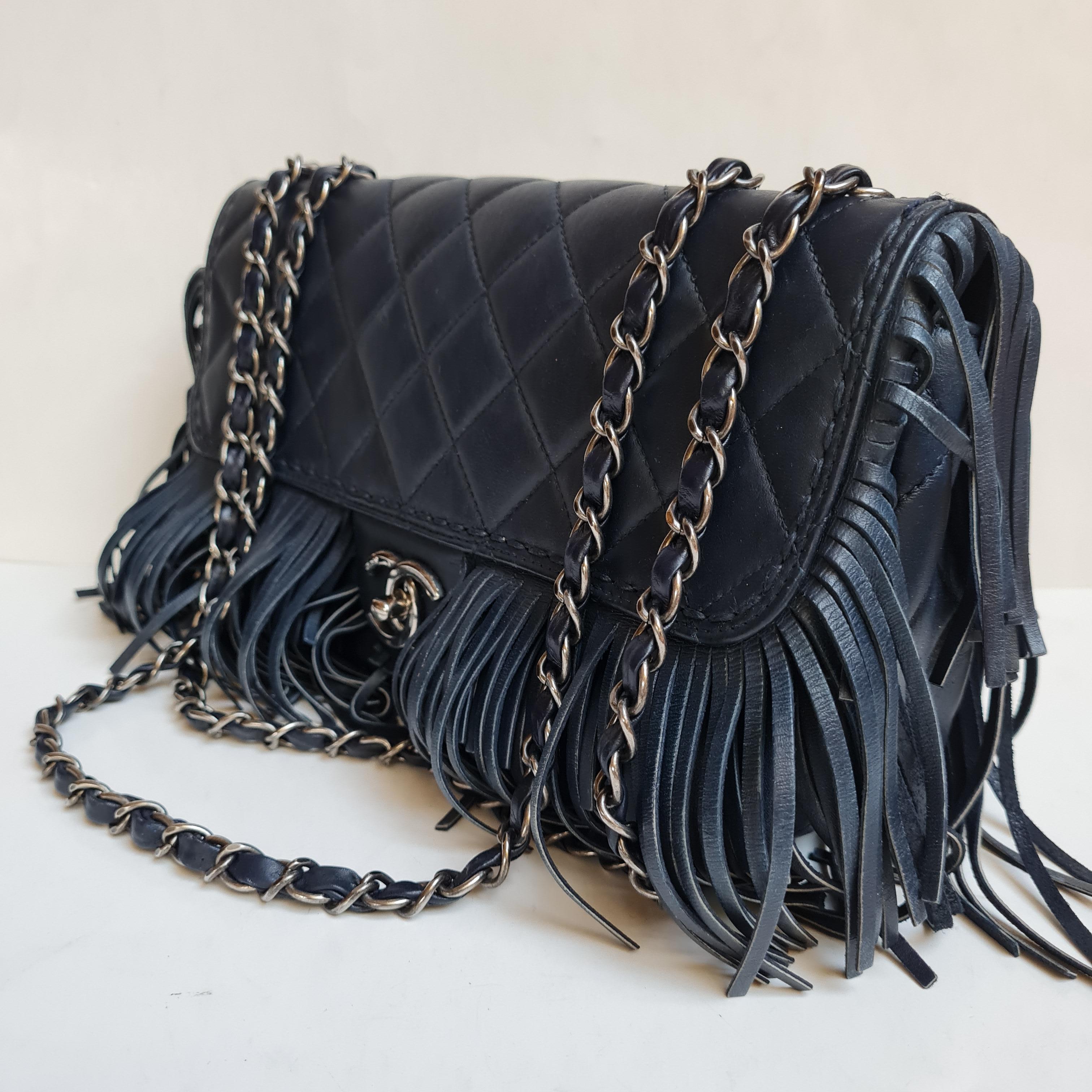 Rare fringe flap bag from the 2014 collection. Still in great condition. 

Inclusion: Authenticity Card, Dust Bag