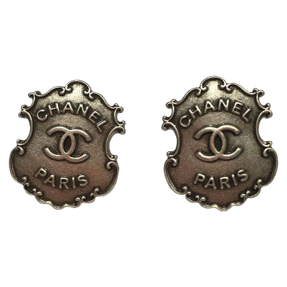 CHANEL Paris-Dallas Stud Earrings in Aged Silver Metal