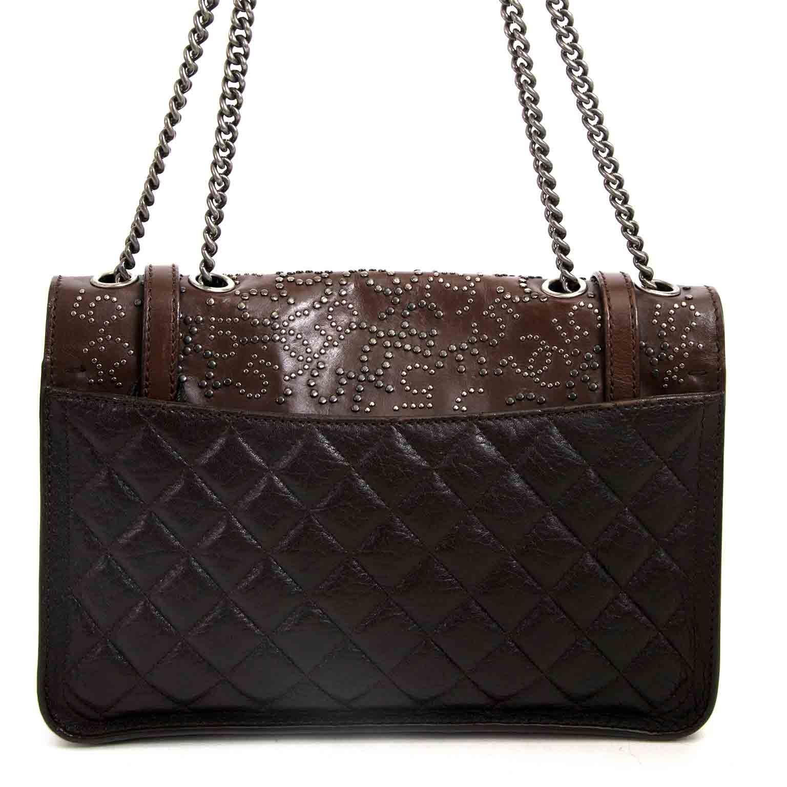 Very good condition

Chanel Paris Dallas Studded Lambskin Western Bag 

The Paris Dallas Chanel collection contains some of the most unique bags, like this beautiful design. 
It's crafted from lambskin leather in different brown tones and finished