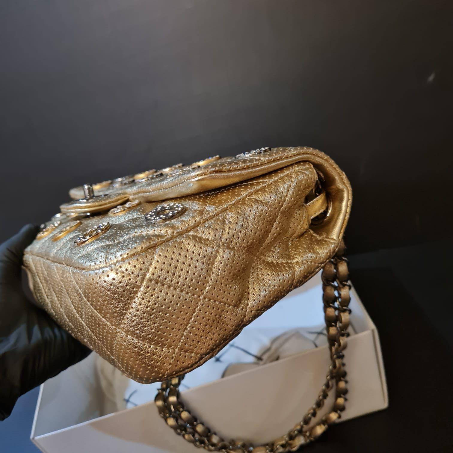 Women's or Men's Chanel Paris-Dubai Medallion Coin Gold Metallic Perforated Medium Flap Bag