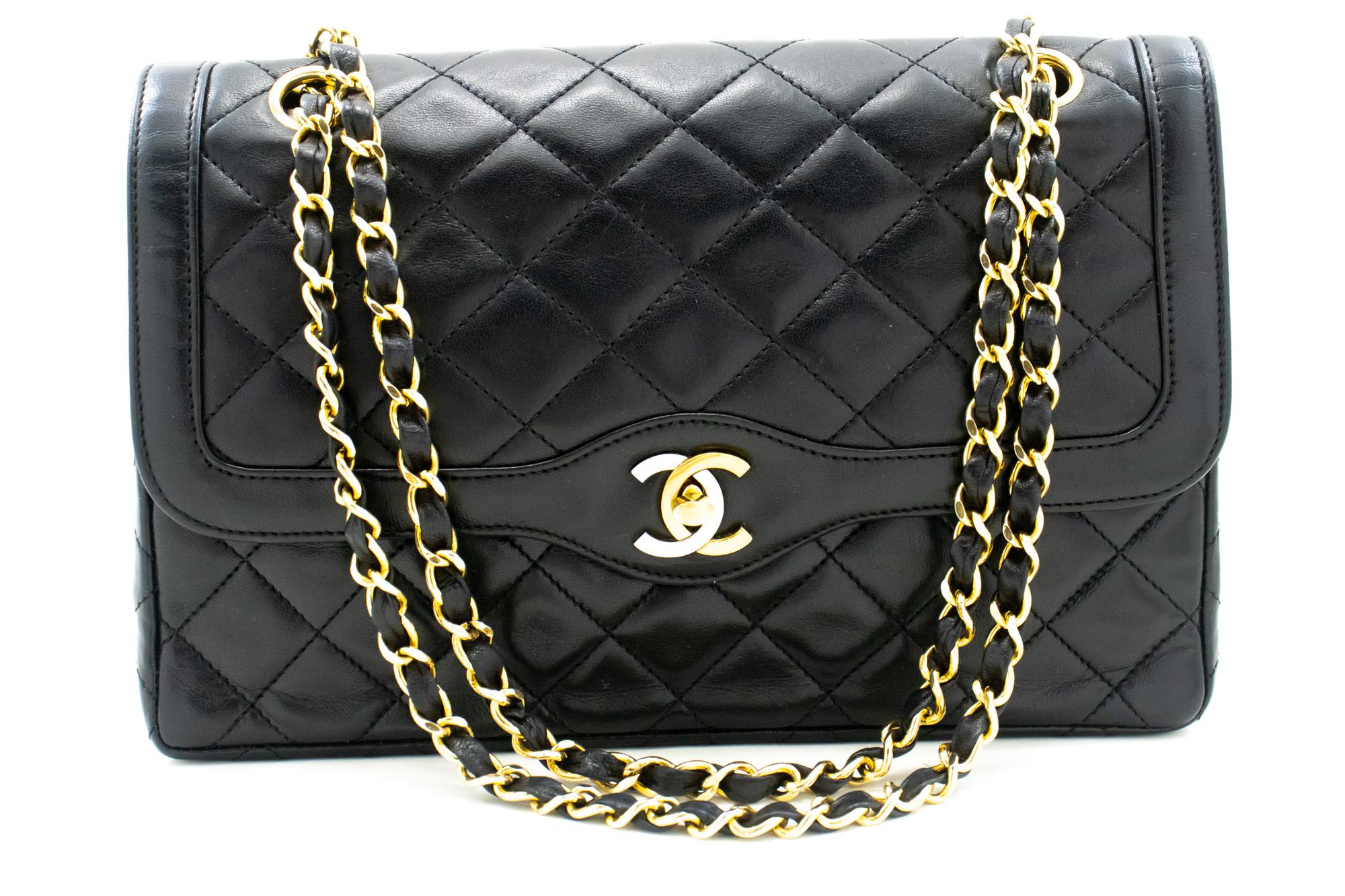 An authentic CHANEL Paris Limited Chain Shoulder Bag Black Quilted Flap Lamb. The color is Black. The outside material is Leather. The pattern is Solid. This item is Vintage / Classic. The year of manufacture would be 1986-1988.
Conditions &