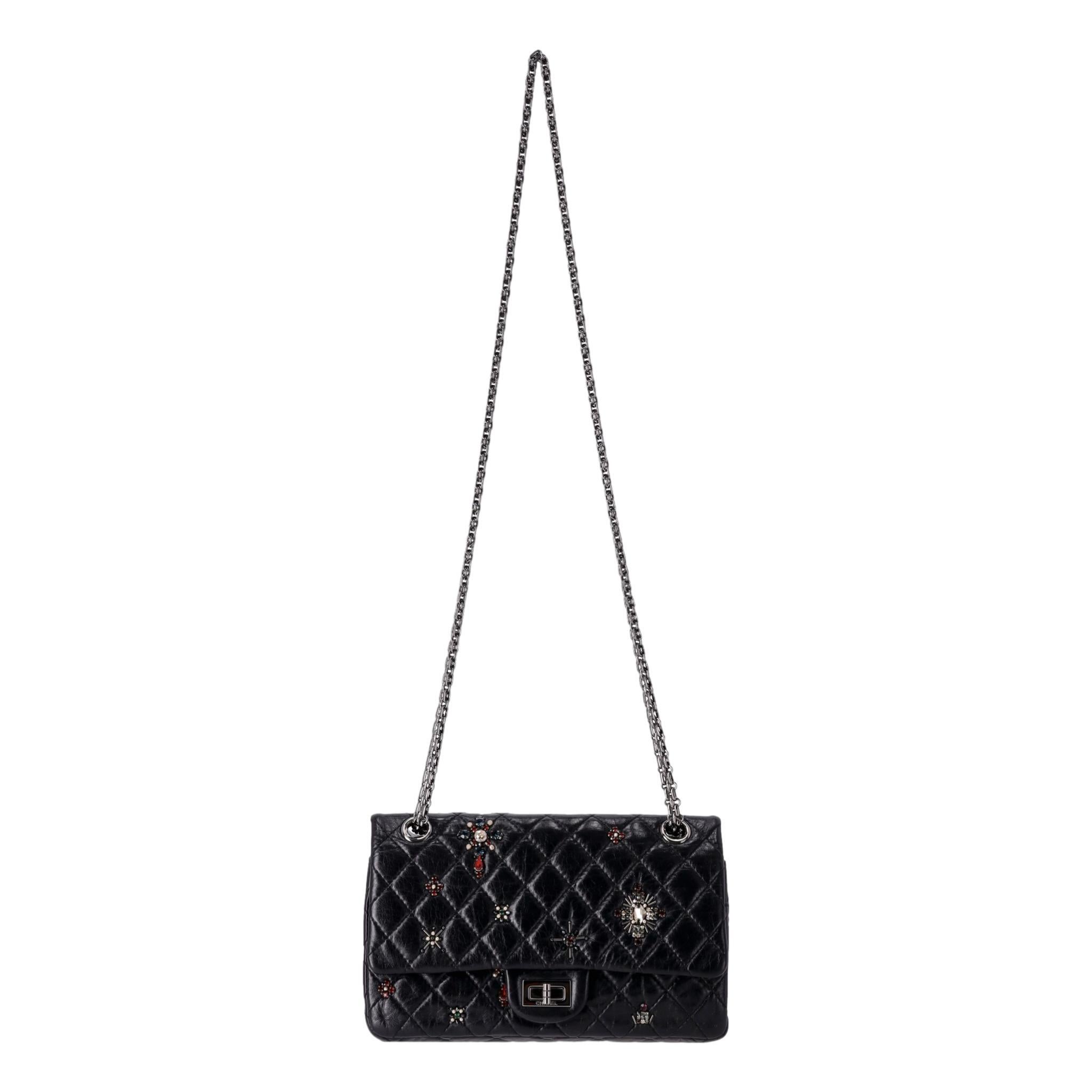 Rare Item  - Chanel Paris-Londres Limited Edition 2.55 Reissue Beaded Bag

From 2008-2009 Paris-Londres Collection - black shoulder/cross body bag crafted from aged leather with signature diamond quilting.

Embellished with multicoloured crystal