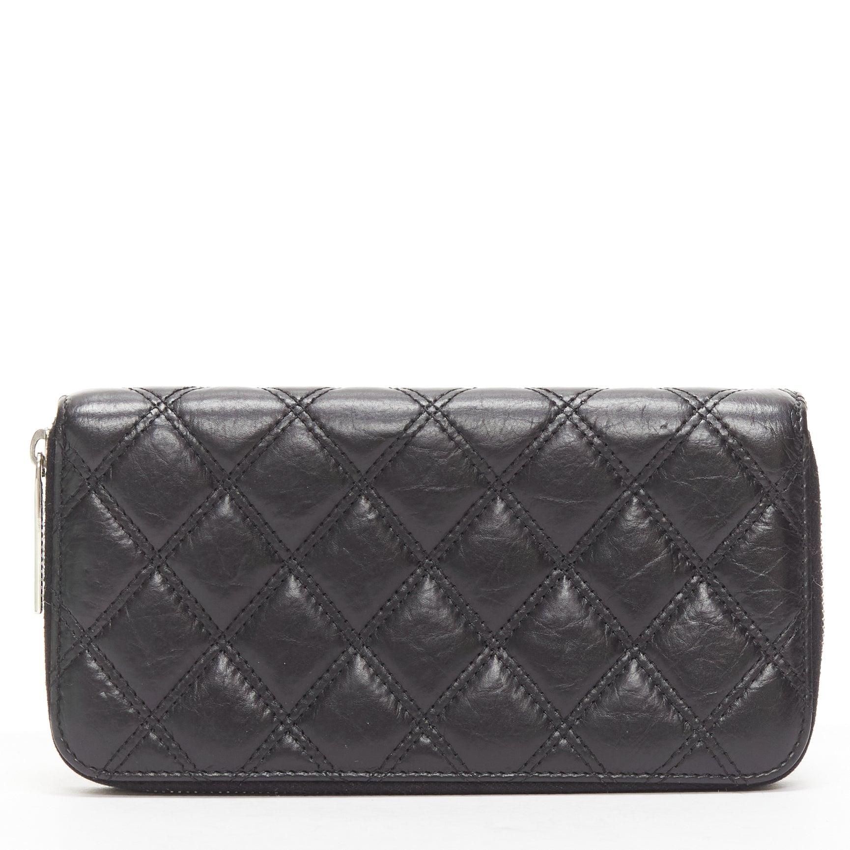CHANEL Paris New York black quilted leather silver logo long zip wallet In Good Condition For Sale In Hong Kong, NT