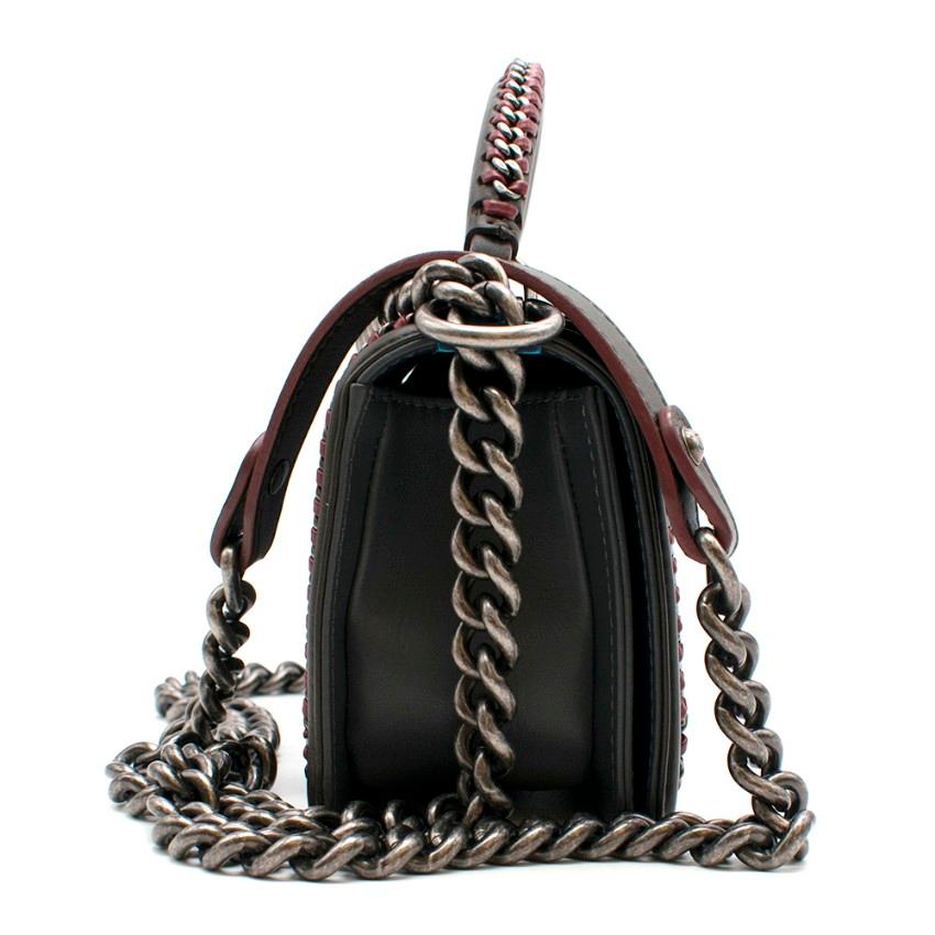 Chanel Paris-Salzburg Limited Edition Grey & Burgundy Top Handle Boy Bag

- Grey Lambskin Body with Charcoal trim & handles
- Burgundy interlaced leather chain detail trim & handle
- Ruthenium hardware.
- Overlock stitch quilting
- one inside slip