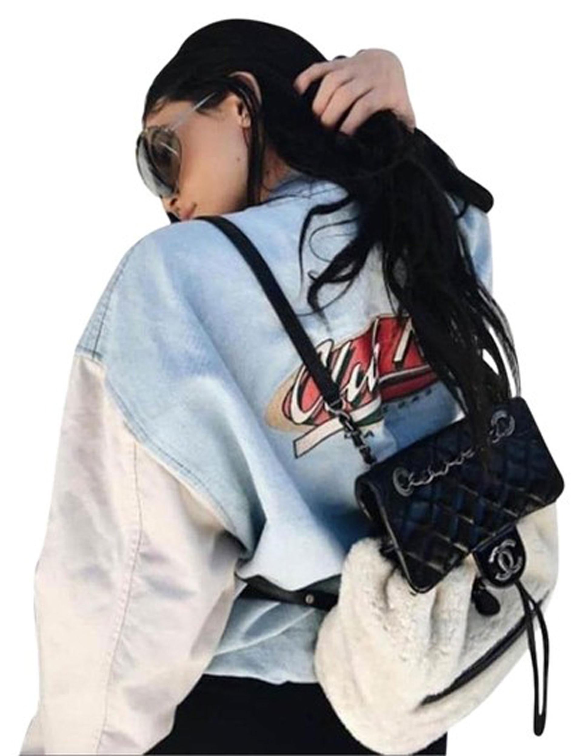 CHANEL Paris-Salzburg backpack in exact size and color as seen on Kylie Jenner. 

Features black calfskin and white (slightly beige) shearling. This model has been sold out and highly sought after. Perfect for upcoming winter season.
This Chanel