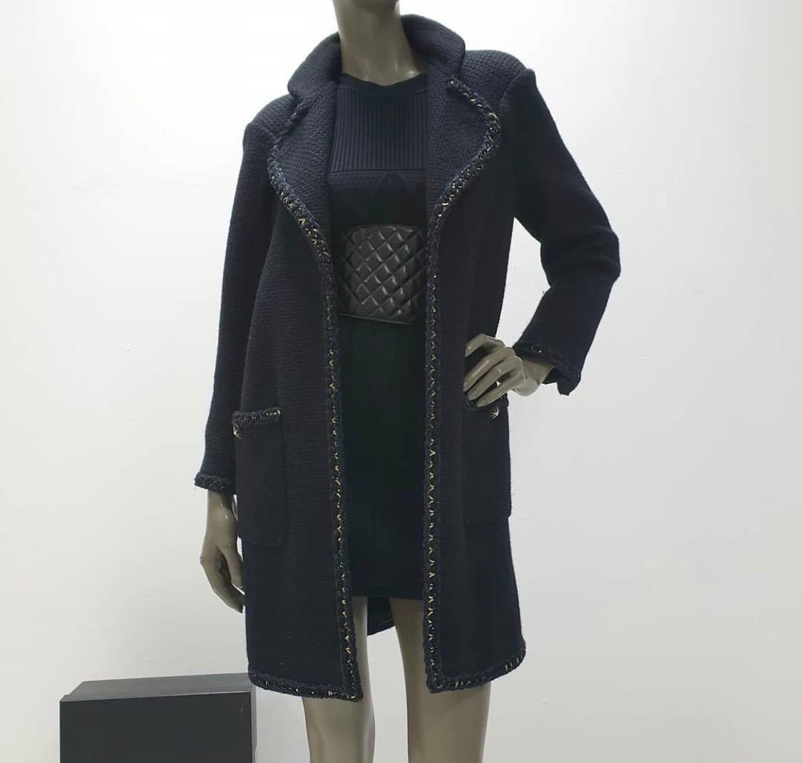 Chanel 15a runway Paris Salzburg collection

Black alpaca coat with navy trim and crystal gripoix buttons.

Retailed for $9990 and sold out

Sz.38

Excellent condition.

For buyers from EU we can provide shipping from Poland. Please demand if you