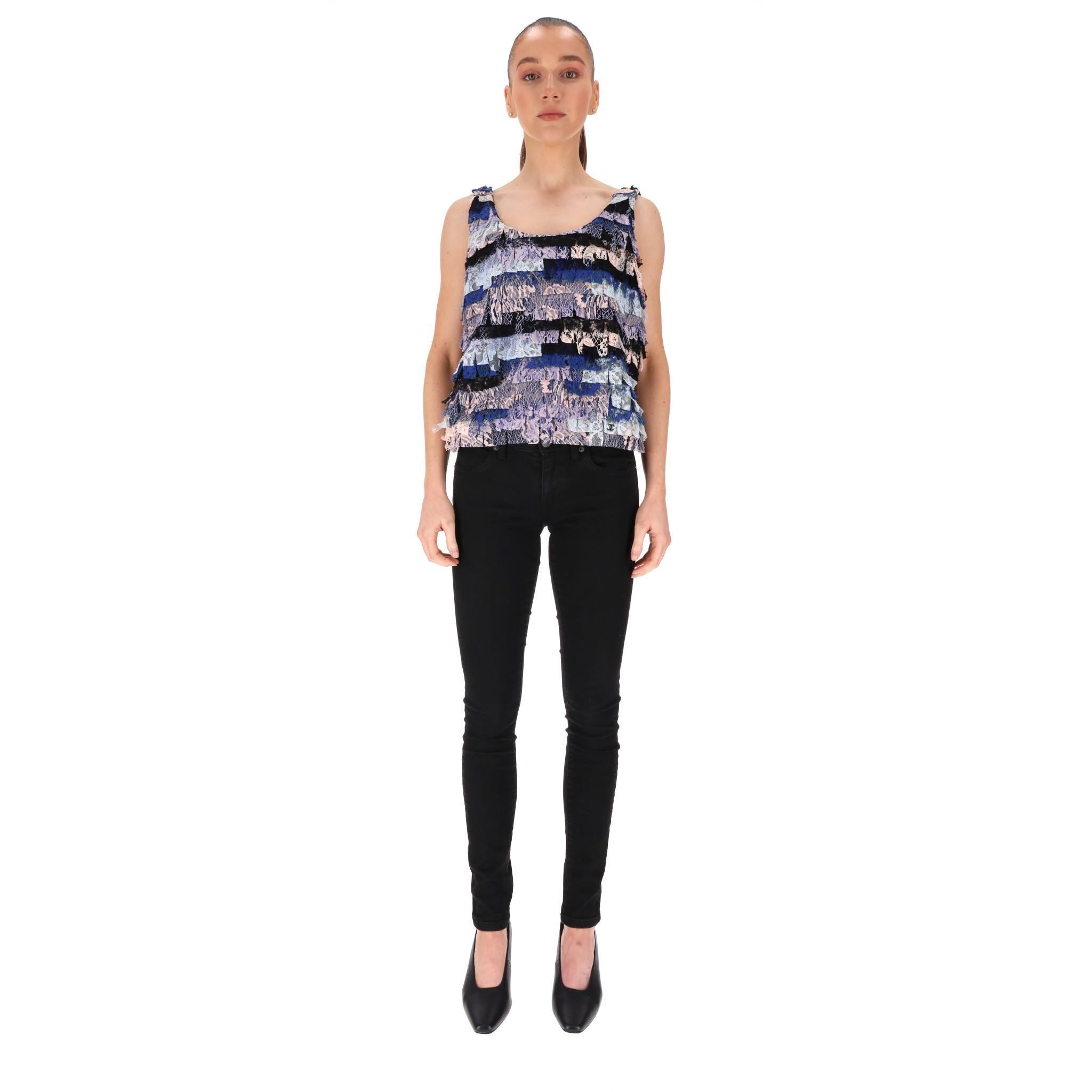 Chanel Paris Seoul Lace Top

From Paris - Seoul 2016 Collection is this multicoloured top with layers of lace to the front and sheer black floral lace to the rear. 

Featuring round neckline and sleeveless design. Rrp Approx. £3,000

Size -