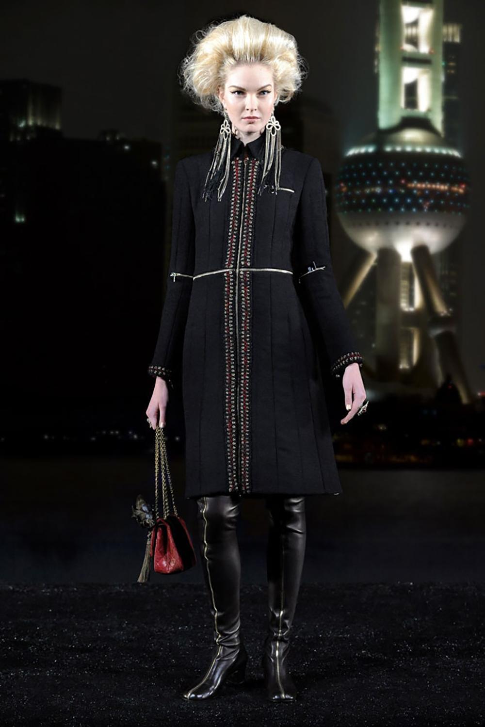 Stunning Chanel black tweed coat with zipper accents ~ from Runway of Paris / SHANGHAI Collection, Metiers d'Art by Karl Lagerfeld
- metallic braided trim
- fancy Chinese motifs silk lining
Size mark 50 FR / Condition: is pristine