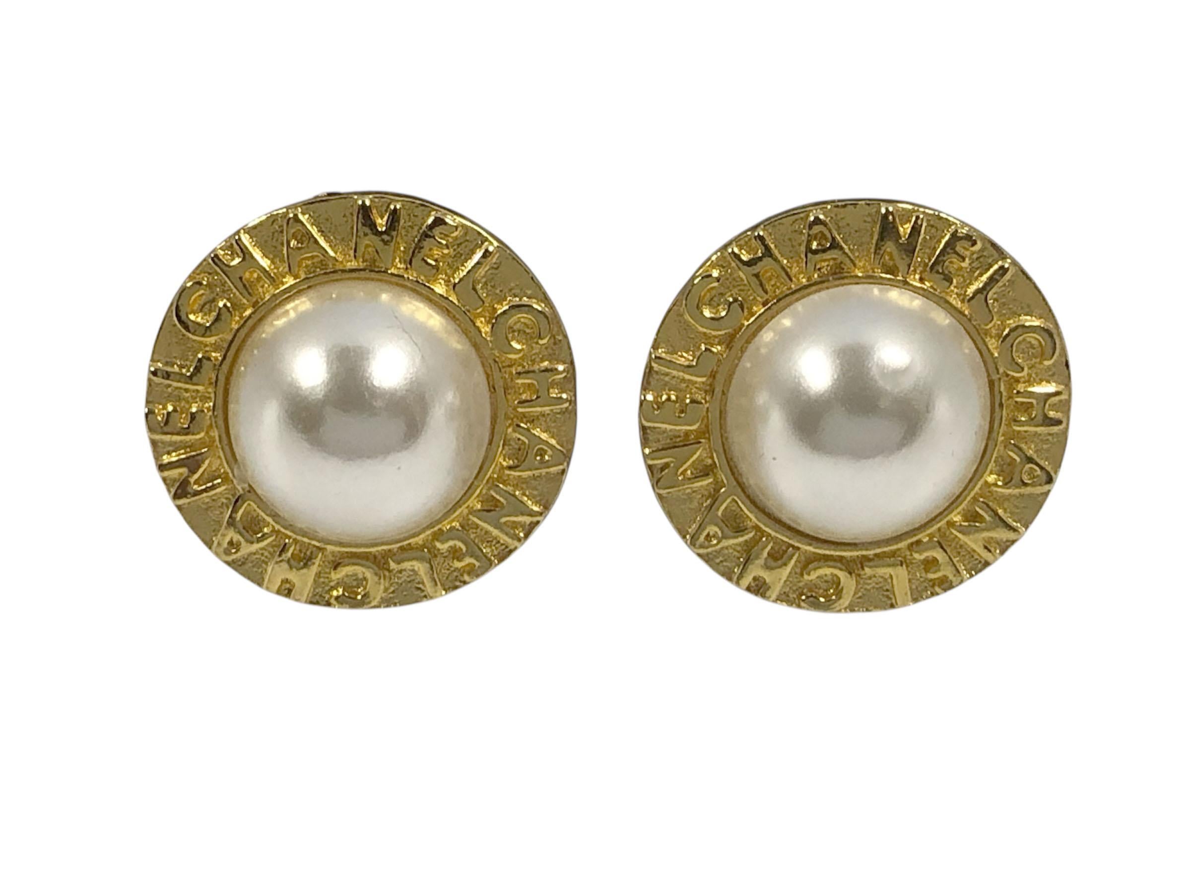 Circa 1990 Chanel Gold Tone Earrings, First Pair measures 1 1/8 inches in diameter and is set with a 17 M.M. Faux Mabe Pearl, having clip backs. Pair 2 measure 1 1/8 inches in diameter, rope border with applied CC logo, clip backs. Both pairs are