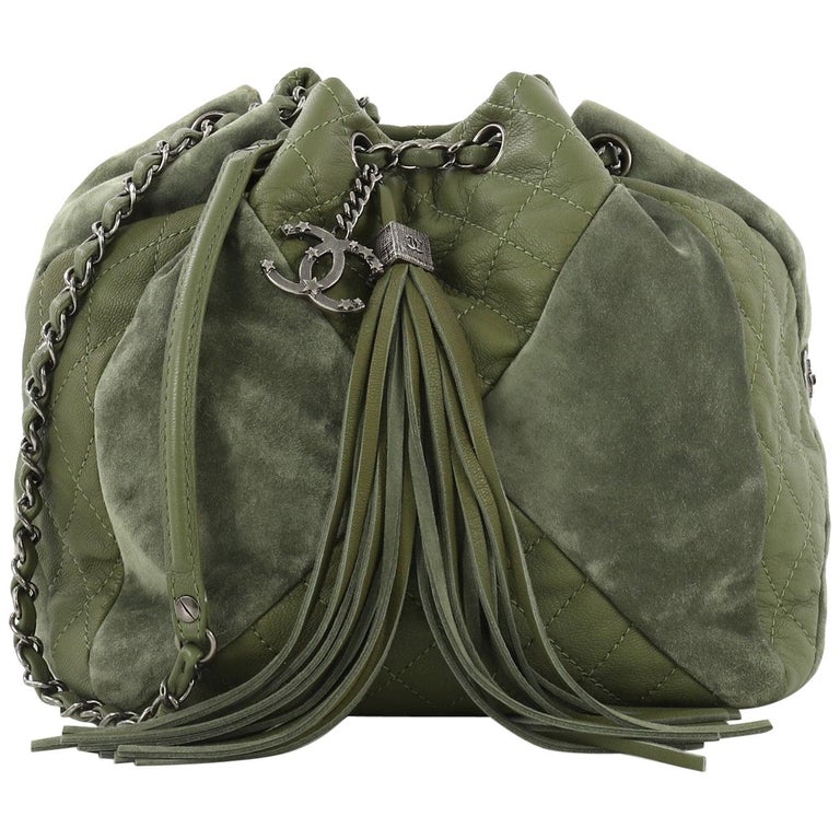 chanel quilted drawstring bag