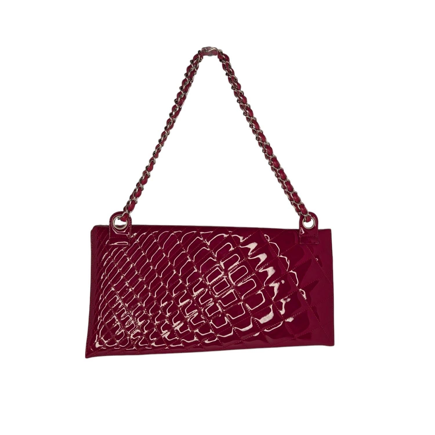 Go glam with this gorgeous and rare Chanel Quilted Patent Leather Kaleidoscope Clutch. Featuring patent quilted leather and features an asymmetrical zip closure with a gunmetal CC logo pull. An elegant and timeless piece to add to any collection.