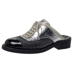 Chanel Lackleder und Folie Lazer Cut Kuba Cruise Oxford Mules Größe 39::5