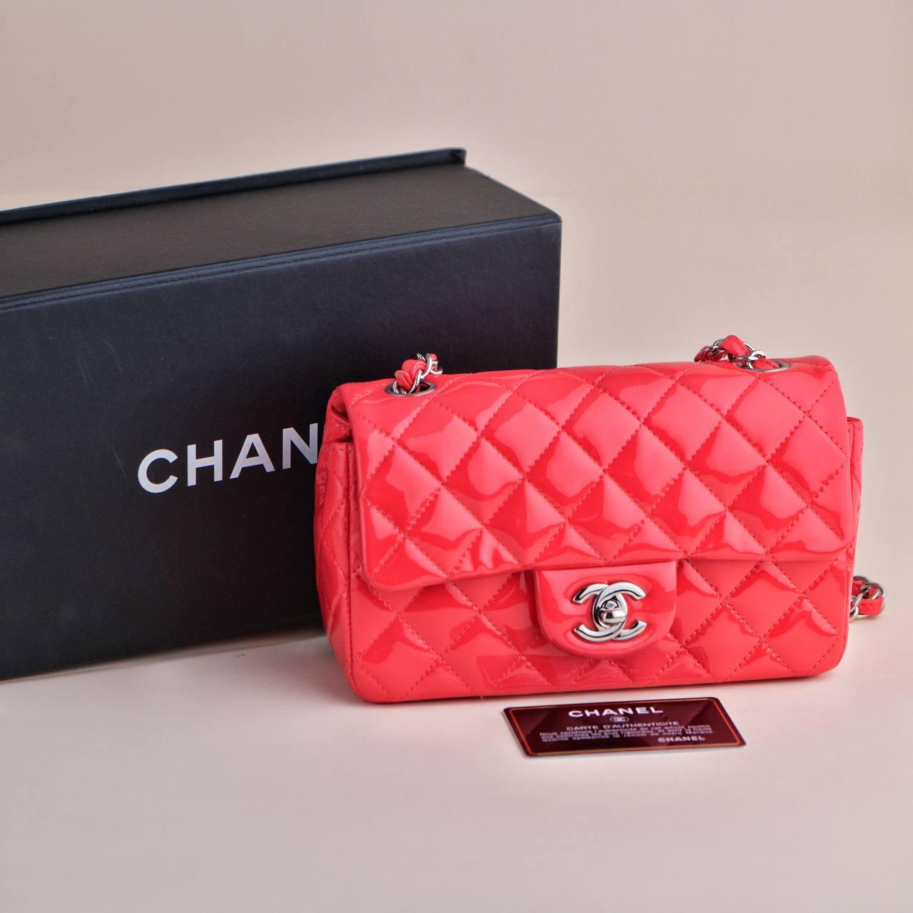 SKU	33301106
Comes With	Chanel Box / Dust bag / Authentic card
Date	2015
Model	Mini Flap
Serial Number	218*****
Metal	Patent Leather
Condition	Excellent
Other Info	Approximate measurements: Length 20cm x 12cm x