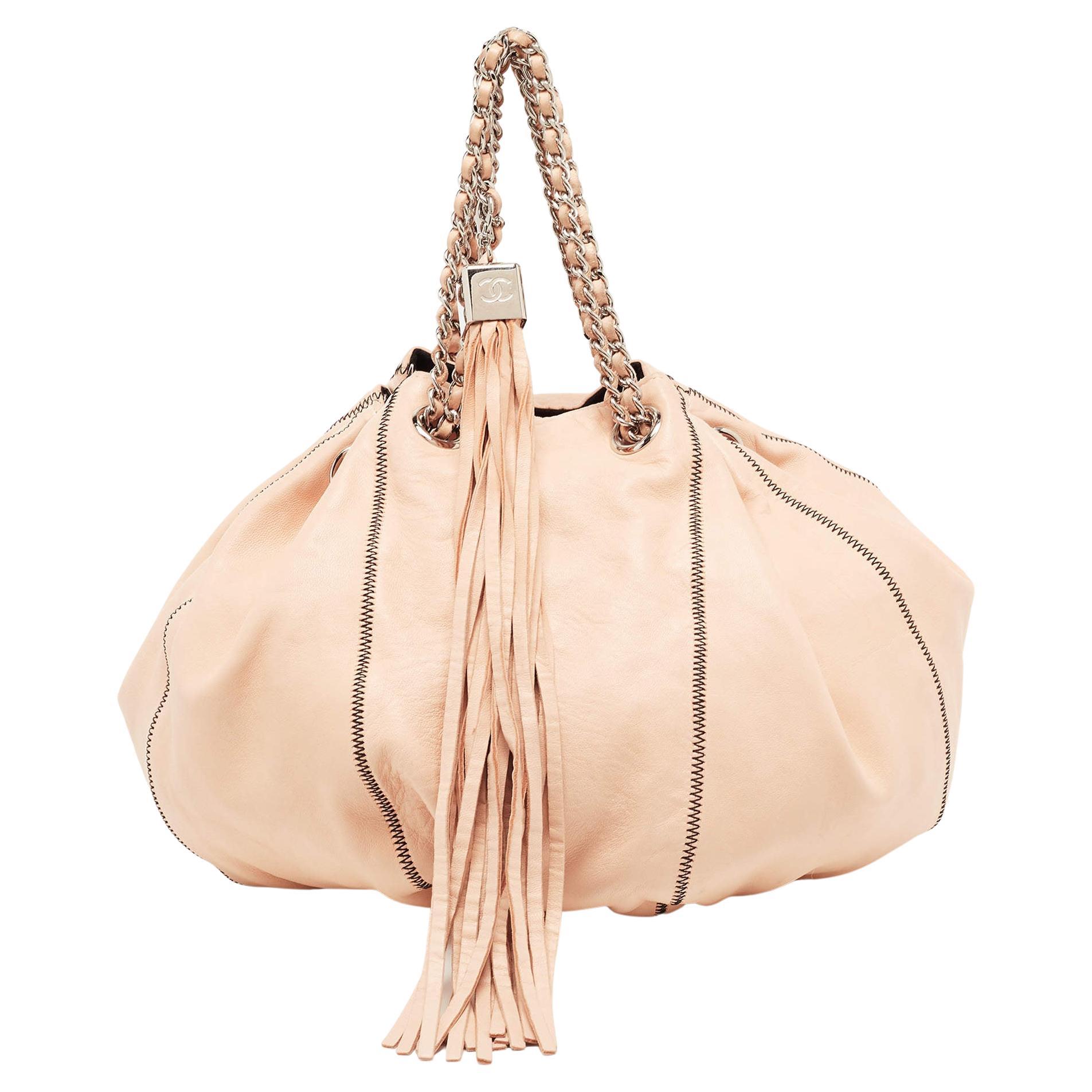 Chanel Peach/Black Leather Reversible Drawstring Tassel Bag For Sale at  1stDibs