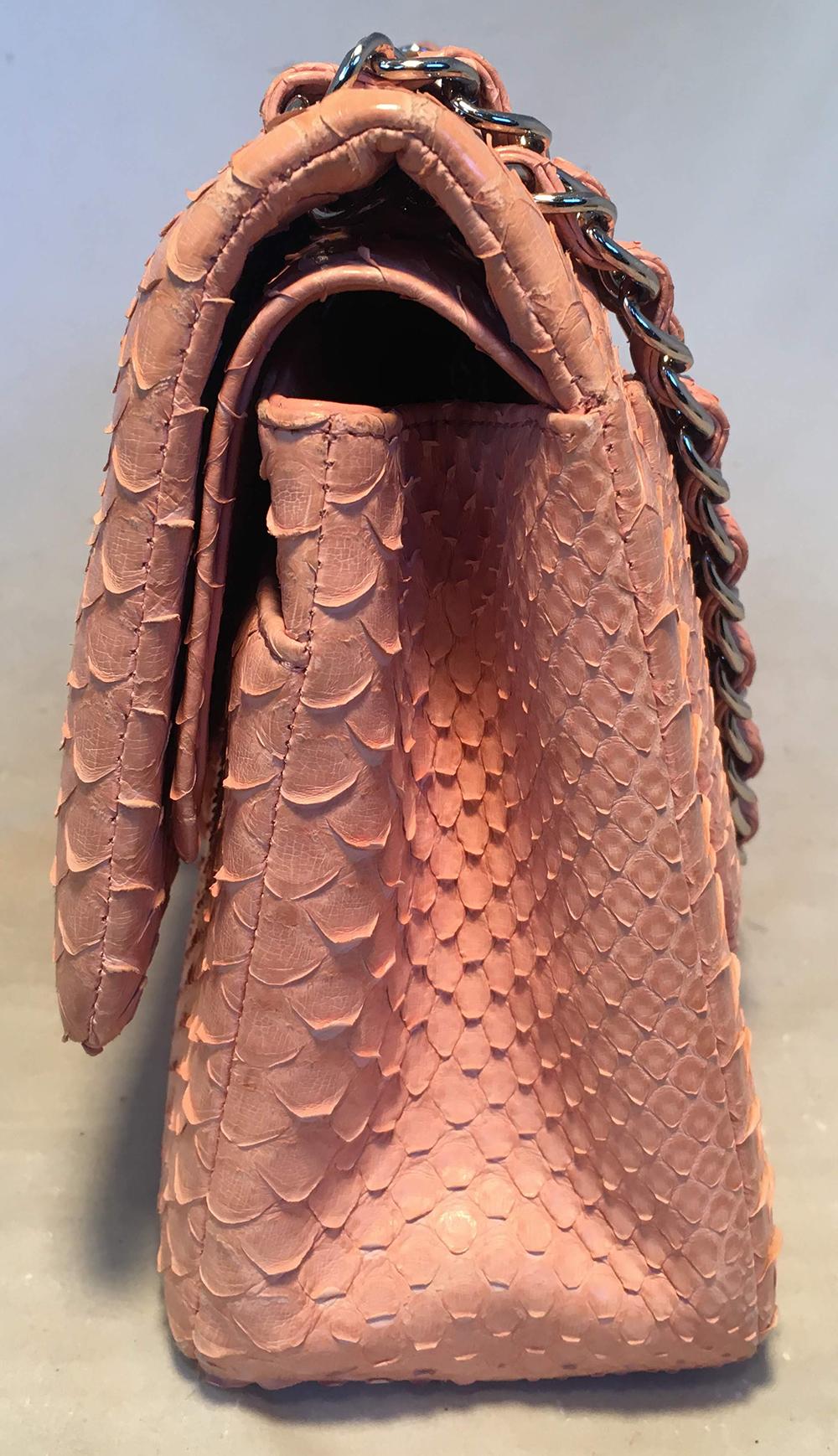 Chanel Peach Pink Python Jumbo 2.55 Double Flap Classic Shoulder Bag in excellent condition. Peachy pink python exterior trimmed with silver hardware. CC logo twist closure opens to a matching pink leather interior that holds 1 love note, 3 slit,