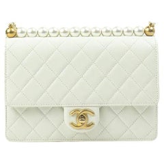 CHANEL, Pear Flap in white leather 
