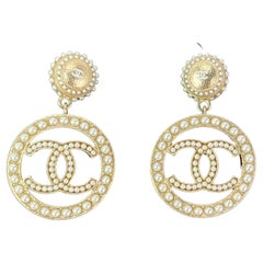 CHANEL Pearl CC Drop Earrings in Gold 