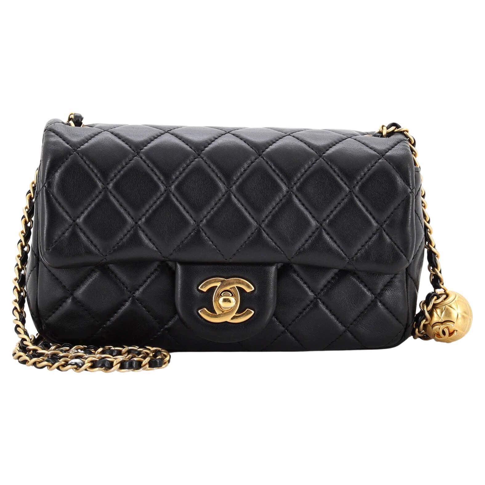 Chanel Black Quilted Calfskin Leather Pearl Micro Bucket Bag at 1stDibs   chanel pearl bucket bag, chanel micro bucket bag, chanel bucket bag with  pearls