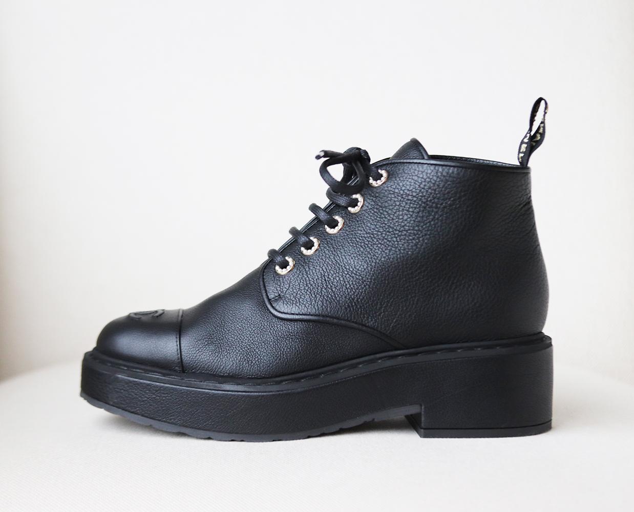 These beautiful Chanel boots are made from soft grained calfskin leather set on a leather lined platform sole, they are embellished with pearl detail around the laces and embroidered detail on the back of the boots.
Heel measures approximately 50mm/
