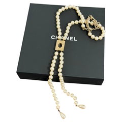 Chanel Pearl Gold Lock Lavalier CC Necklace