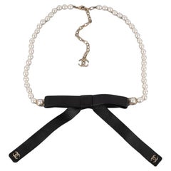 Collar de perlas Chanel / Cinturón con lazo