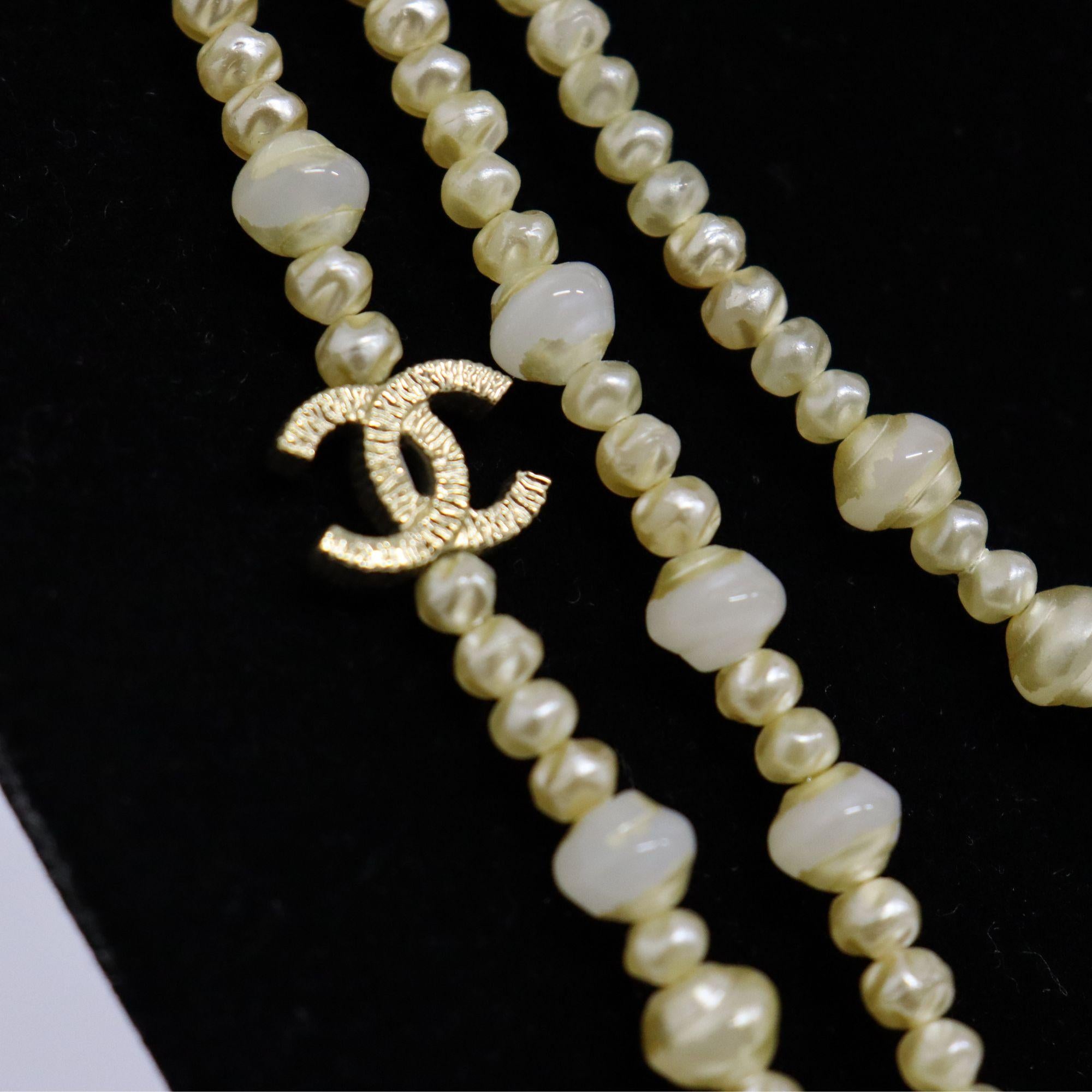 chanel triple strand pearl necklace