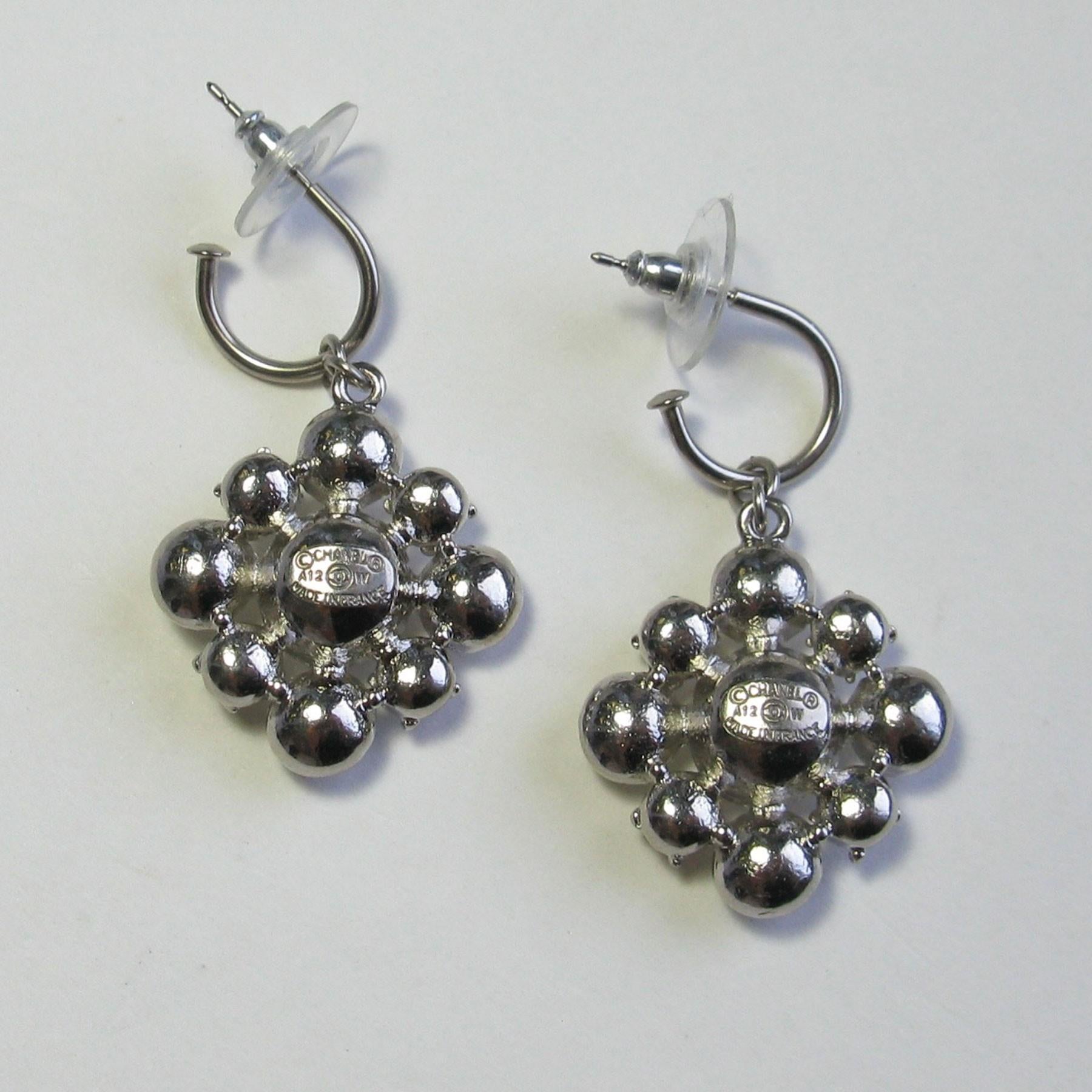 silver cc earrings