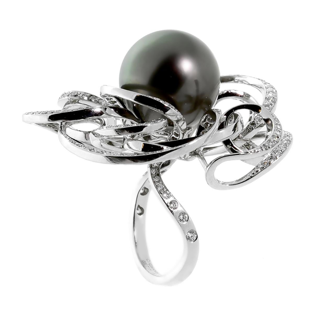 A magnificent Chanel cocktail ring featuring a 14.5mm pearl surrounded by 1.44ct of shimmering Chanel round brilliant cut diamonds in 18k white gold. The ring measures 1.41