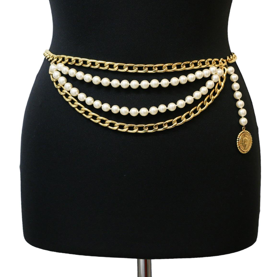 Condition : very good
Made in France
Material :24K gold plated metal and perlescent beads 
Color : golden
Measurements : total length 75 cm
Size : 70/75
Gold finish metal
Year : vintage
Details : The belt is adjustable because the hook can be fasten