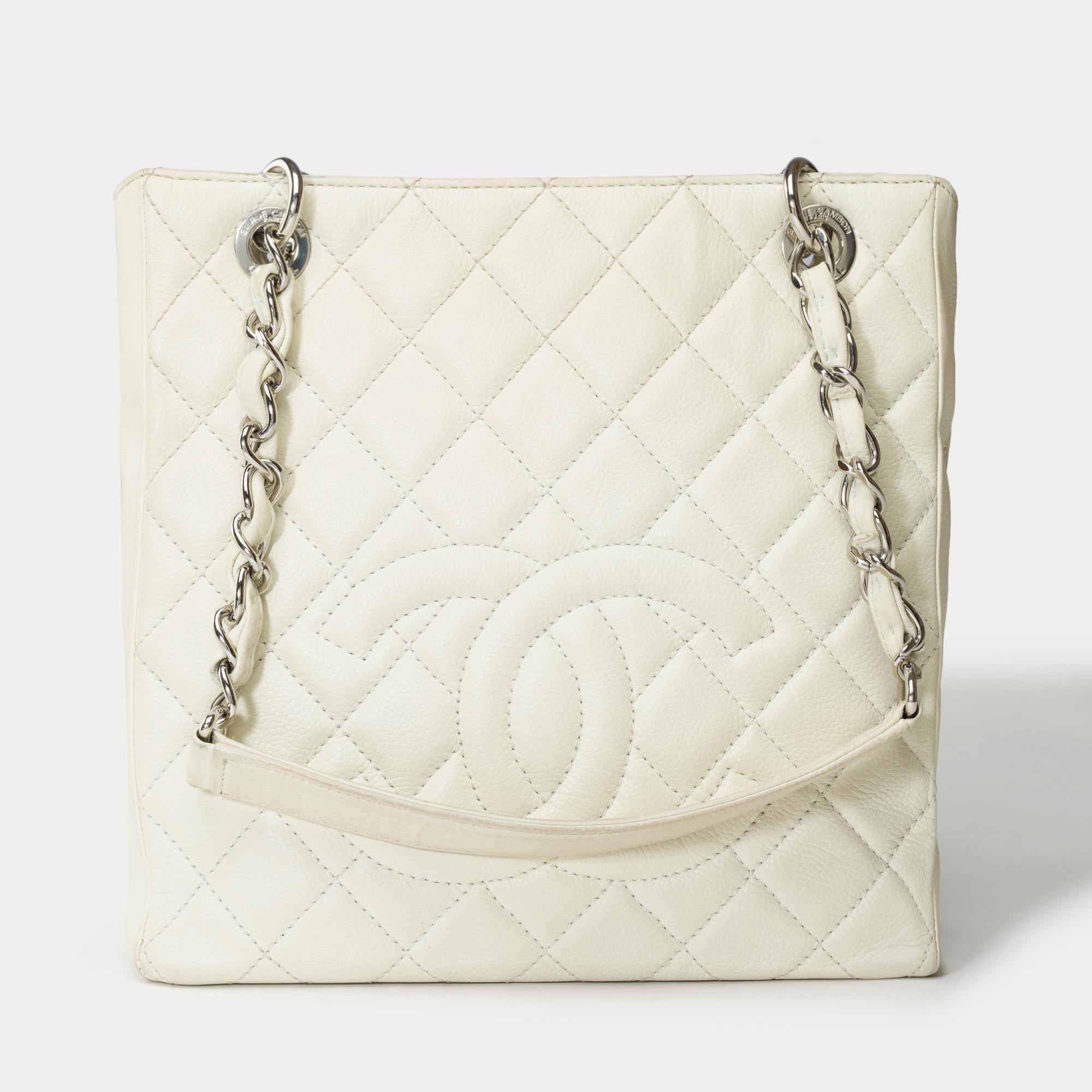 Chanel​​ ​​Shopping​​ ​​PST​​ ​​(Petit​​ ​​Shopping​​ ​​Tote)​​ ​​bag​​ ​​in​​ ​​in​ ​off-white​ ​caviar​ ​leather,​​ ​​silver​​ ​​metal​ ​trim,​​ ​​double​​ ​​handle​​ ​​in​​ ​​silver​​ ​​metal​​ ​​interwoven​​ ​​with​​ ​​off-white​ ​​leather​​