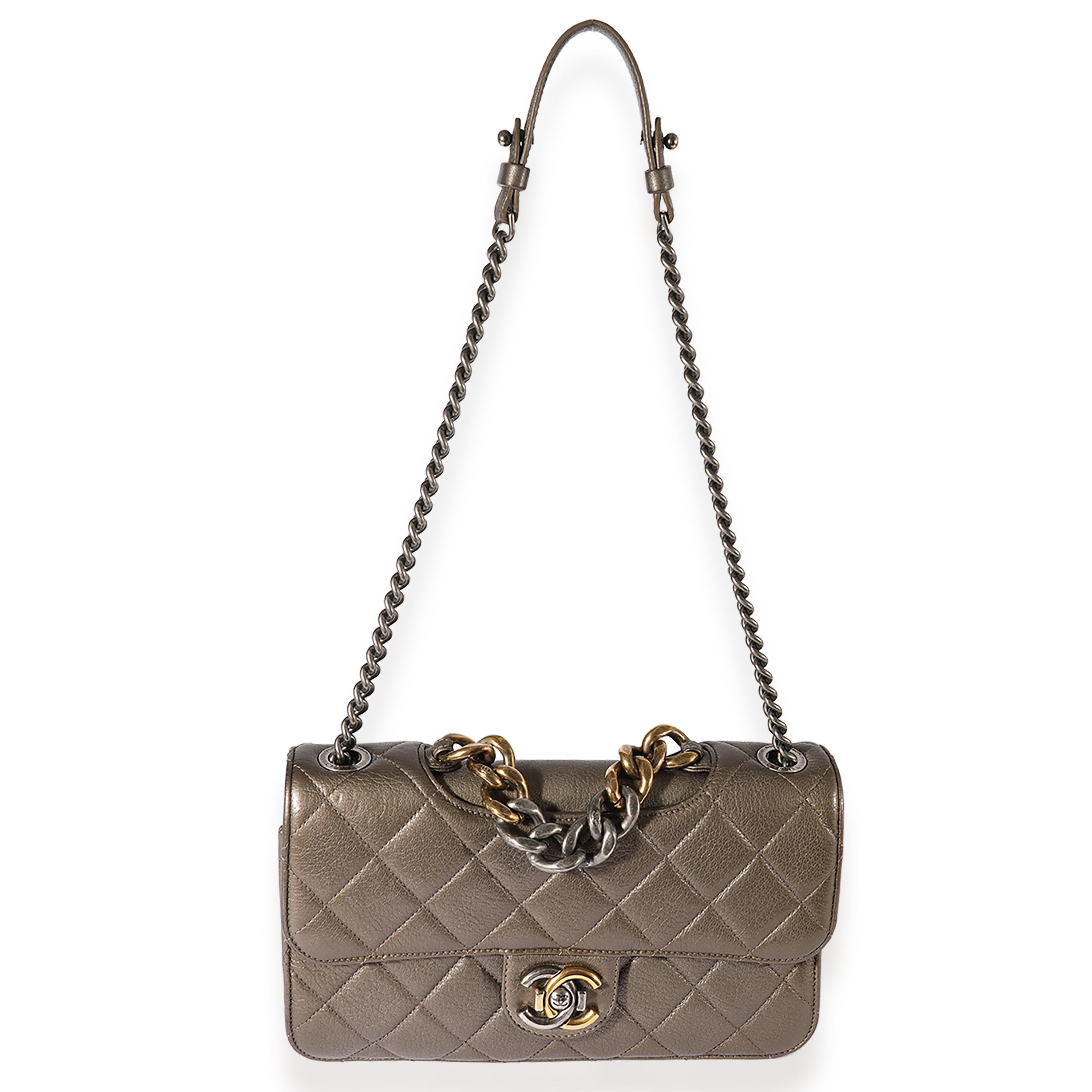 Listing Title: Chanel Pewter Quilted Leather Small Pondicherry Flap Bag
SKU: 122955
MSRP: 3200.00
Condition: Pre-owned 
Handbag Condition: Very Good
Condition Comments: Very Good Condition. Plastic a some hardware. Scuffing at corners. Scratching at