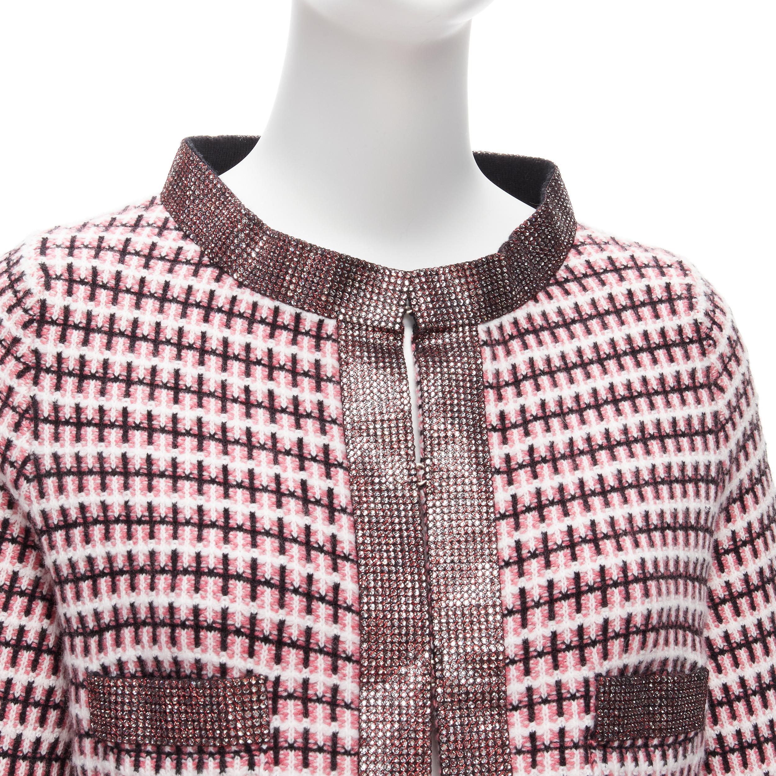 CHANEL pink 100% cashmere tweed crystal trim swing cardigan jacket FR34 XS
Reference: TGAS/D00179
Brand: Chanel
Designer: Karl Lagerfeld
Material: Cashmere
Color: Pink, Black
Pattern: Tweed
Closure: Hook & Bar
Extra Details: Chanel logo button at