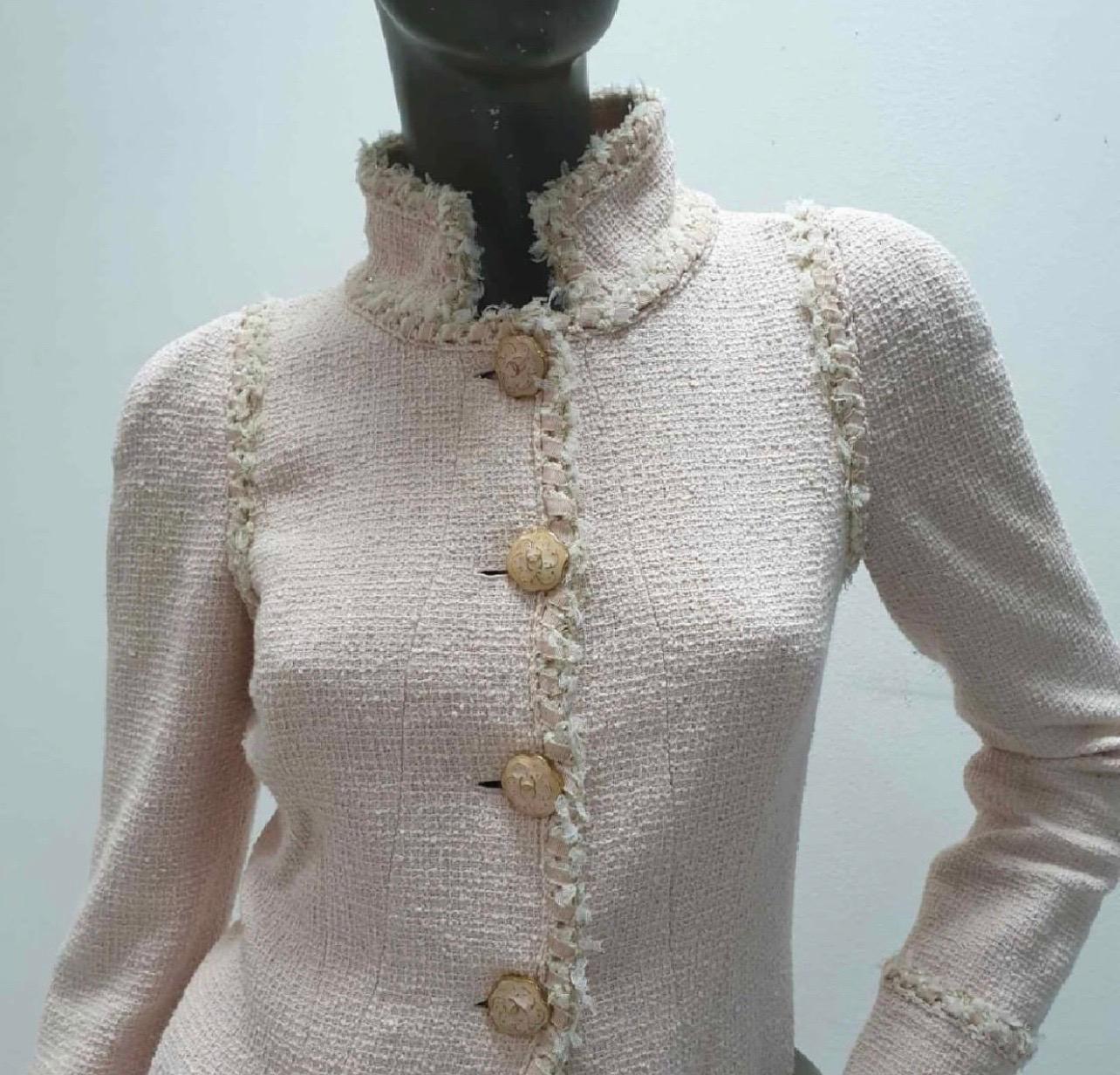 Chanel Spring Cruise 2013 Pink Boucle Fringe Military Style Pea Coat 3/4 Jacket.

Size FR 38

Intricate lace trim, fringe edging, iconic Chanel boucle, Chanel enamel and gold tone filigree buttons.

From the 2013 resort / cruise runway collection.