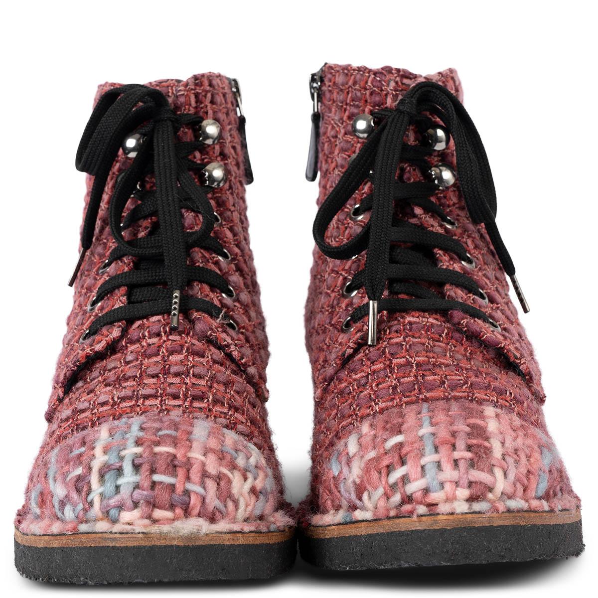 100% authentic Chanel tweed lace-up ankle boots in raspberry and red tweed featuring classic cap toe in rose pink, lilac and light blue chunky knit wool set on black crepe sole. Have been worn and are in excellent condition. 

2014