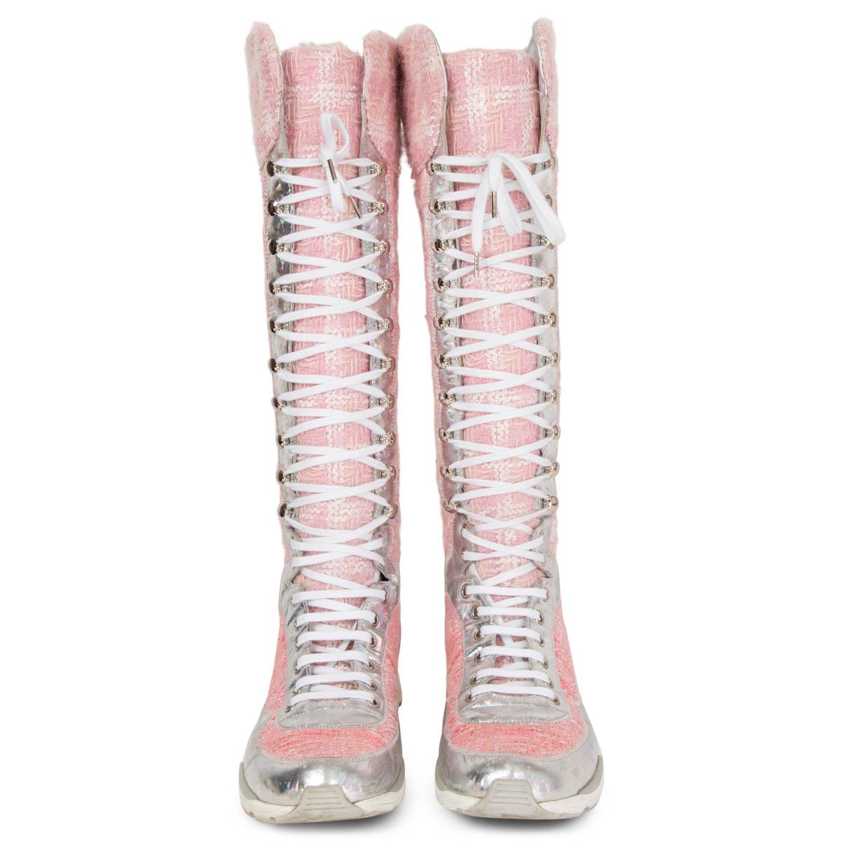 100% authentic Chanel lace-up sneaker boots in pink and white wool bouclé tweed fabric with light pink suede and silver metallic hologram leather panls. Fall/Winter 2014 Supermarket collection. Boots feature a white rubber sole. Have been worn and