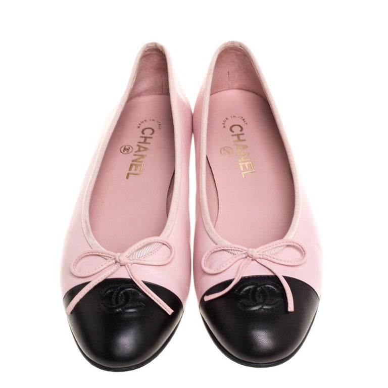 pink and black chanel flats