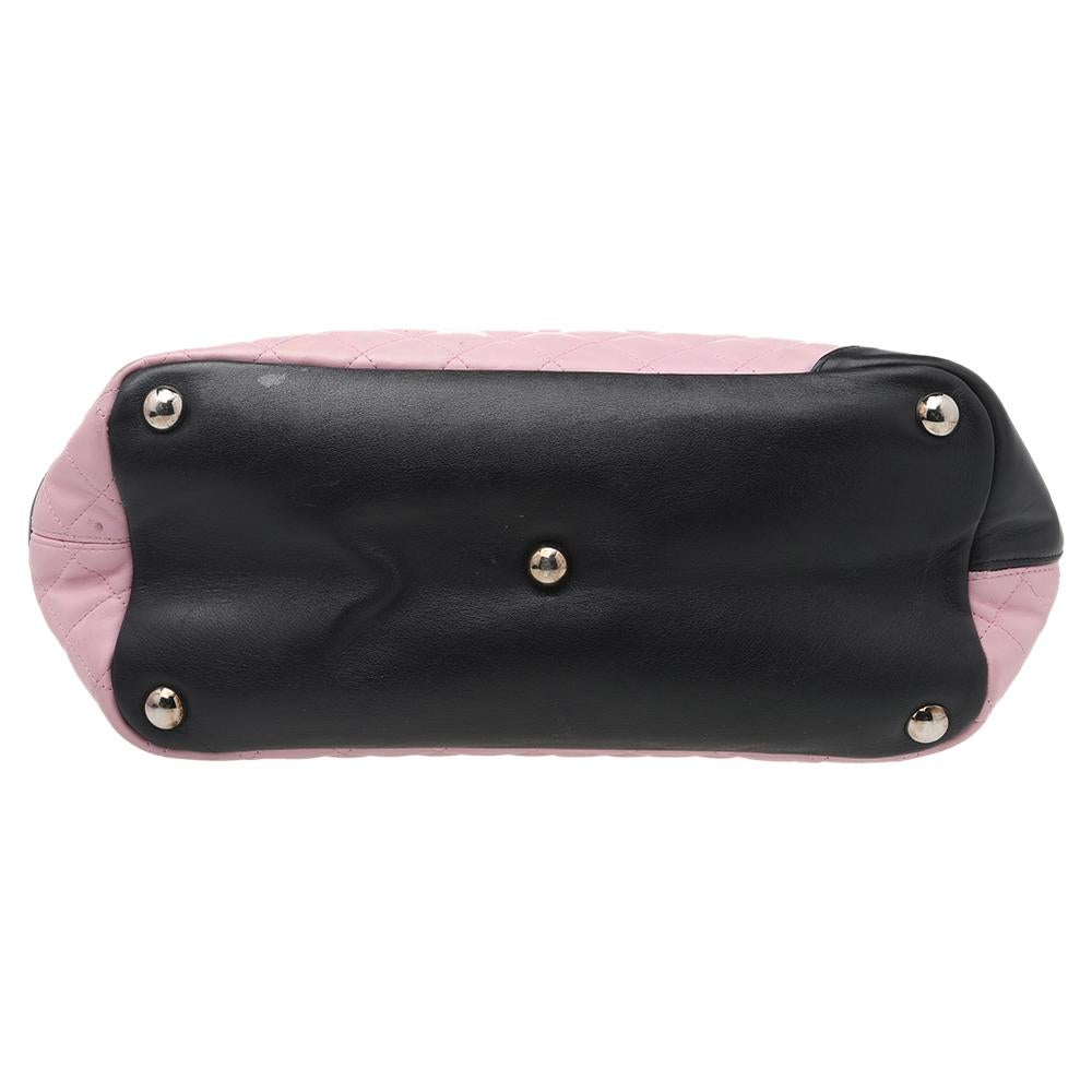 pink and black handbag