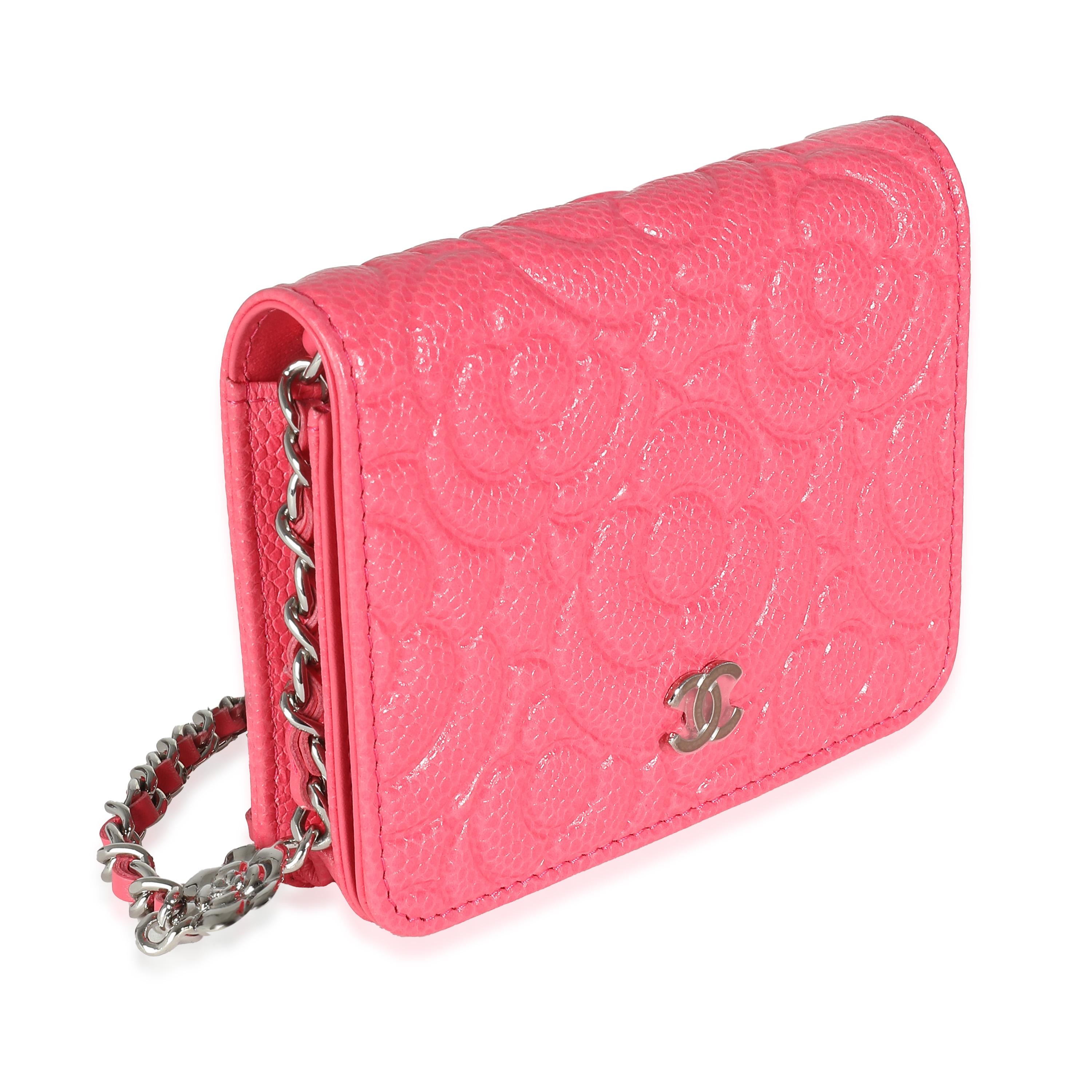 Listing Title: Chanel Pink Caviar Camellia Embossed Chain Belt Bag
SKU: 140806
Condition: Pre-owned 
Handbag Condition: Excellent
Condition Comments: Item is in excellent condition and displays light signs of wear. Plastic along hardware closure.