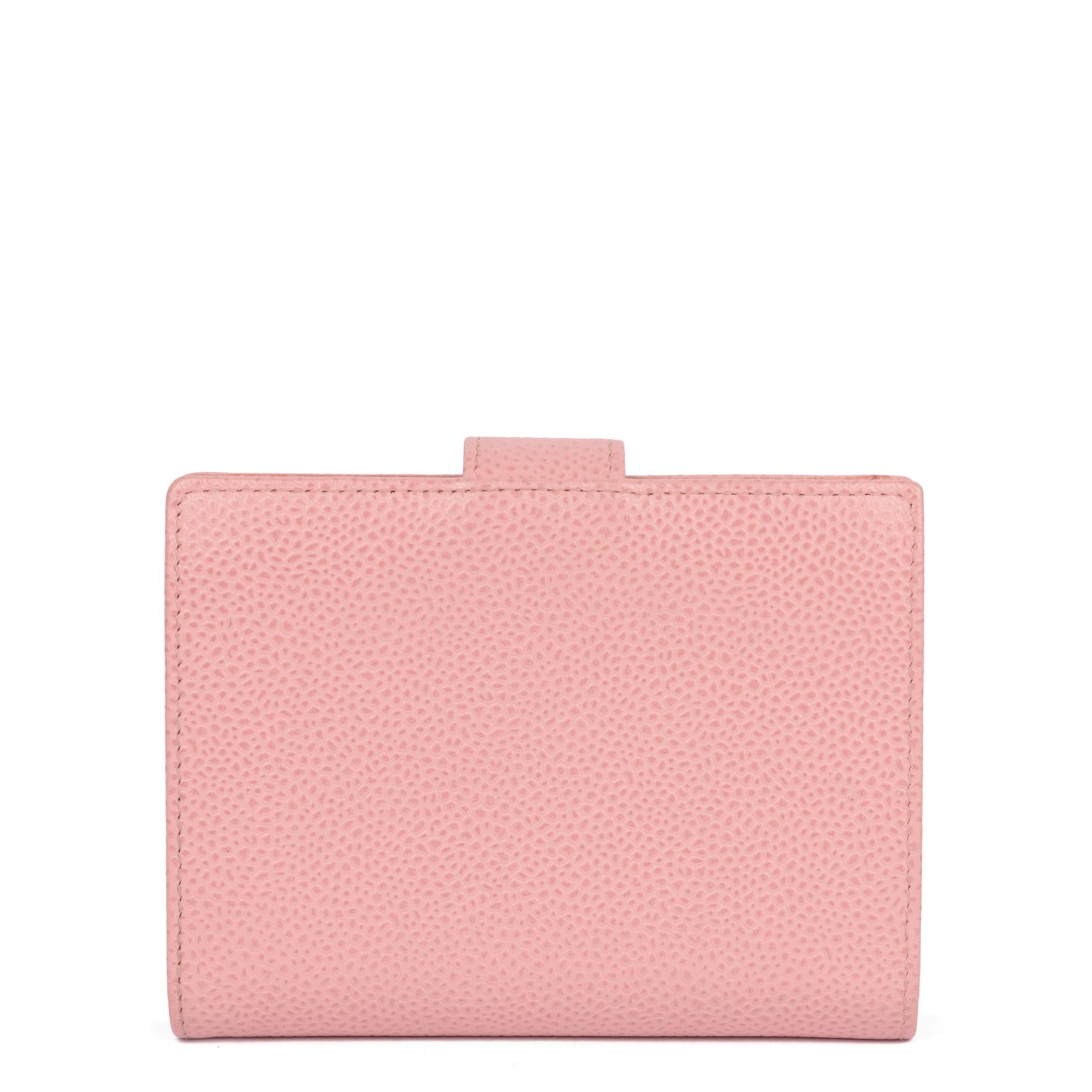 Chanel Pink Caviar Lambskin Leather Timeless Compact Wallet

CONDITION NOTES
The exterior is in very good condition with minimal signs of use.
The interior is in exceptional condition with minimal signs of use.
The hardware is in very good condition