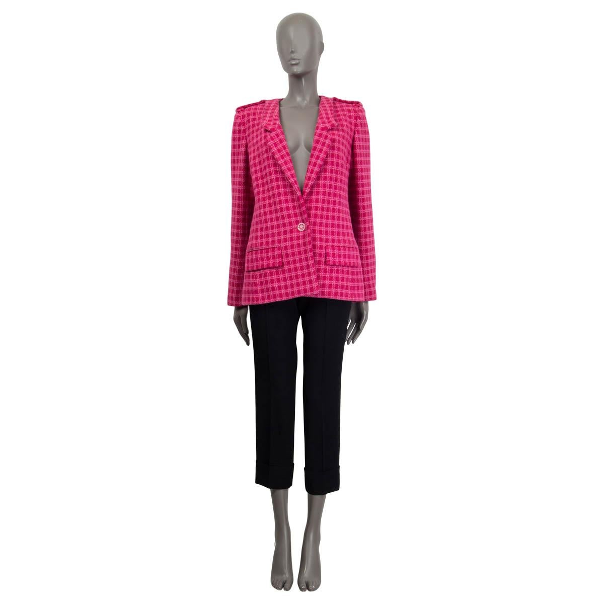 100% authentic Chanel Cruise 2016 Seoul oversized one-button tweed blazer in pink cotton (92%) and acrylic (8%). Features epaulettes at the shoulders and buttoned cuffs. Has two sewn shut flap pockets on the front. Opens with one button at th front.