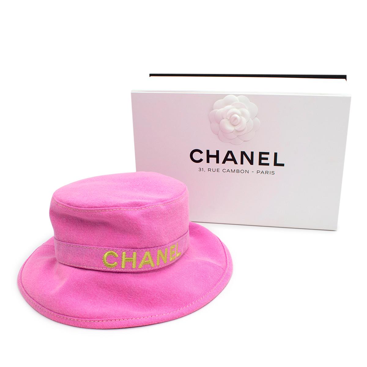 Chanel Pink Cotton Bucket Hat - Rare

- Tonal stitching
- Embroidered yellow Chanel logo at the front
- Partially lined

Materials:
100% Cotton

PLEASE NOTE, THESE ITEMS ARE PRE-OWNED AND MAY SHOW SIGNS
OF BEING STORED EVEN WHEN UNWORN AND UNUSED.