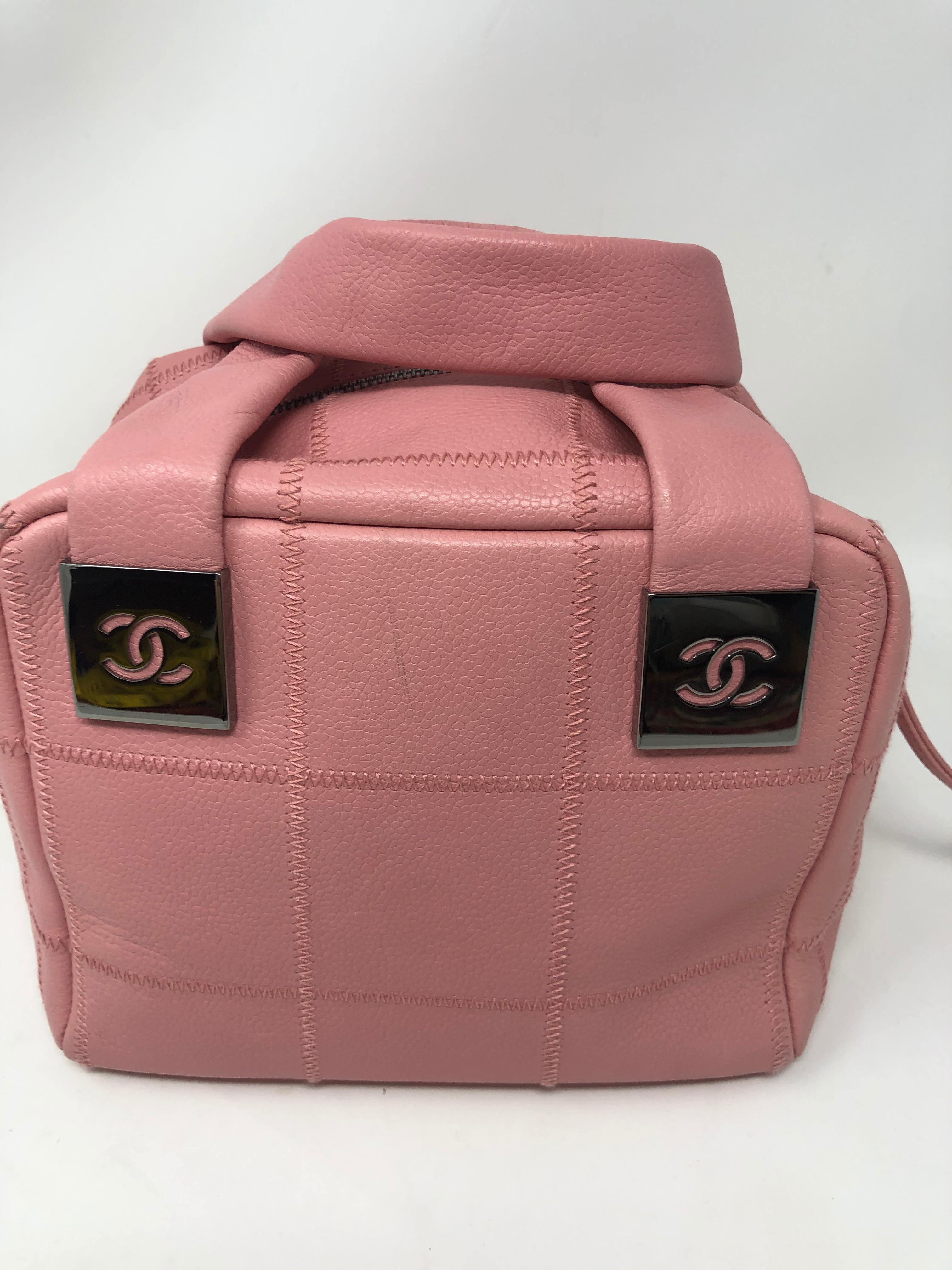 Chanel Pink Cube Bag with silver hardware. Vintage and cute style. Pink leather bag in good condition. Guaranteed authentic. 