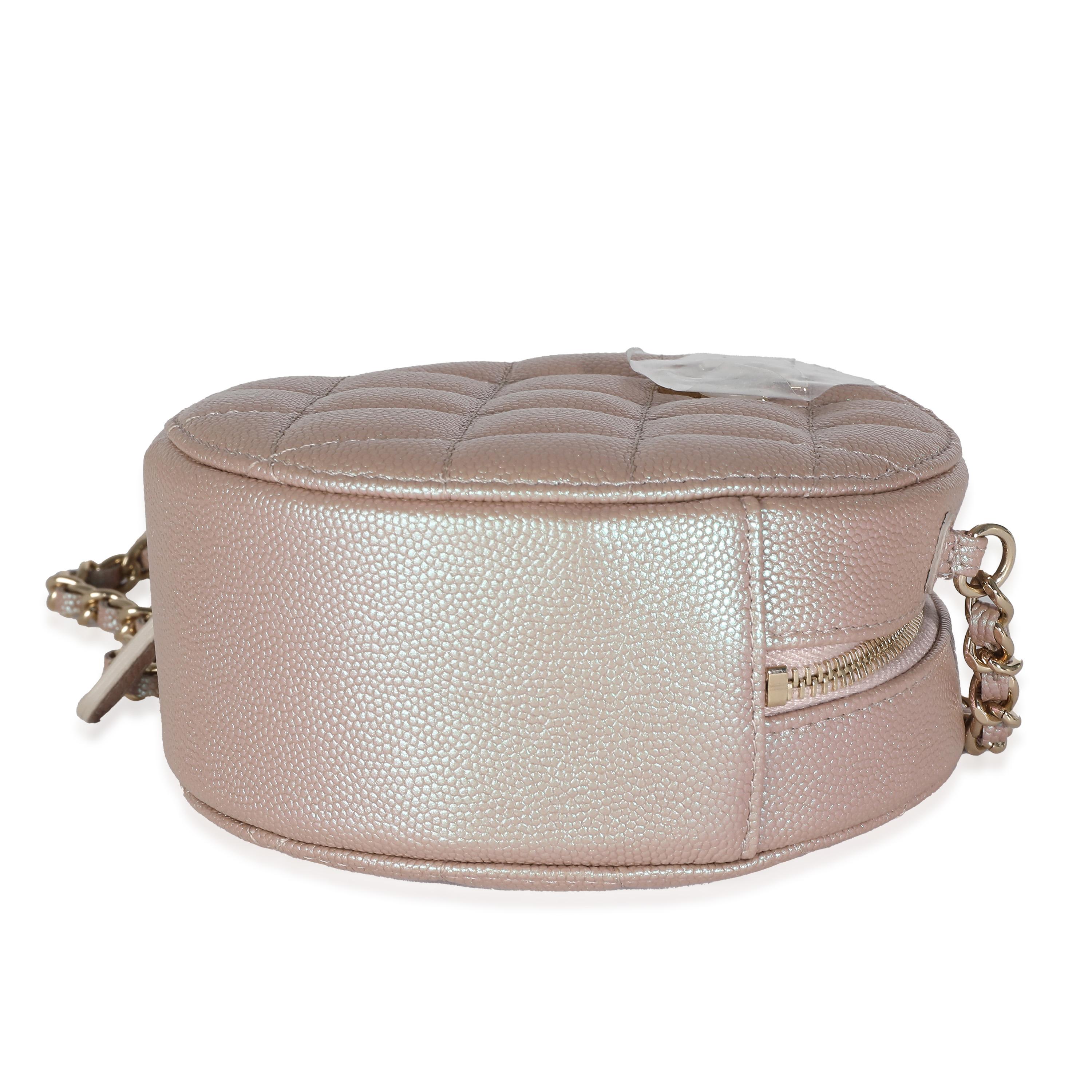 Listing Title: Chanel Pink Iridescent Quilted Caviar Round Clutch With Chain
SKU: 139328
Condition: Pre-owned 
Handbag Condition: Excellent
Condition Comments: Item is in excellent condition and displays light signs of wear. Light marks along