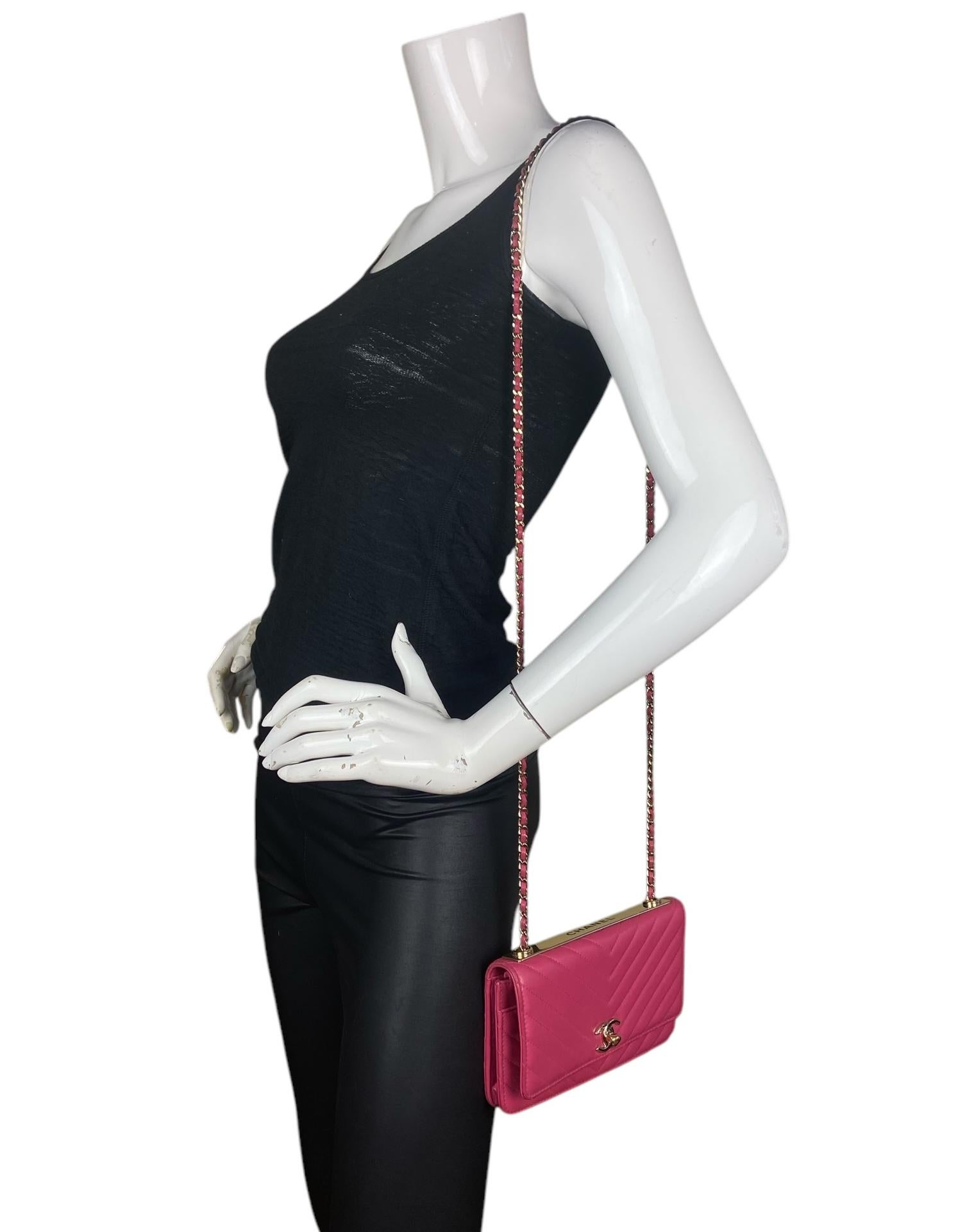 Chanel Pink Lambskin Chevron Quilted Trendy CC Wallet On Chain WOC Crossbody Bag

Made In:
Color: Pink
Hardware: Pale goldtone
Materials: Lambskin leather
Lining: Leather & grosgrain
Closure/Opening: Flap top with cc twistlock
Exterior