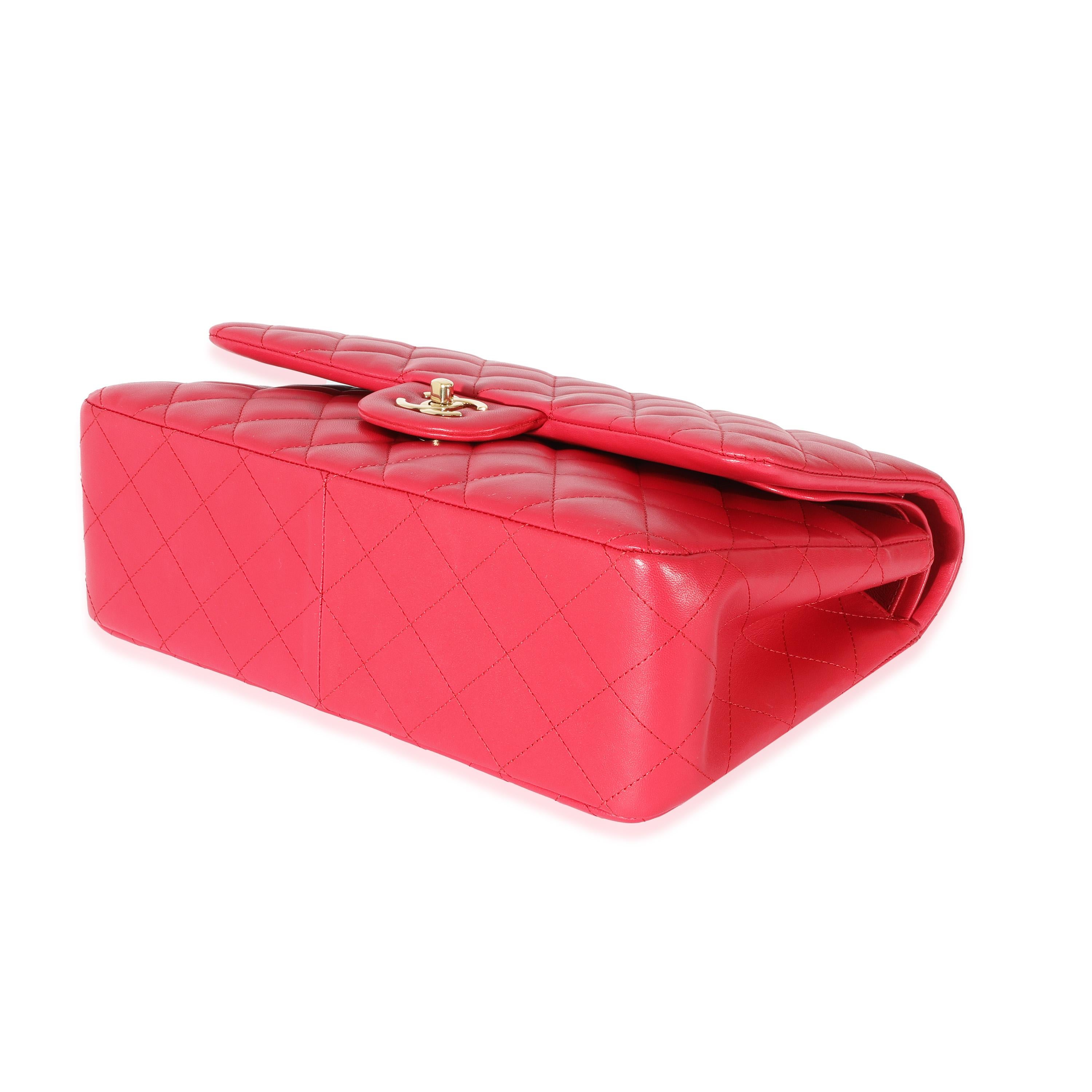 Listing Title: Chanel Pink Lambskin Classic Jumbo Double Flap
 SKU: 128430
 MSRP: 9500.00
 Condition: Pre-owned 
 Condition Description: A timeless classic that never goes out of style, the flap bag from Chanel dates back to 1955 and has seen a